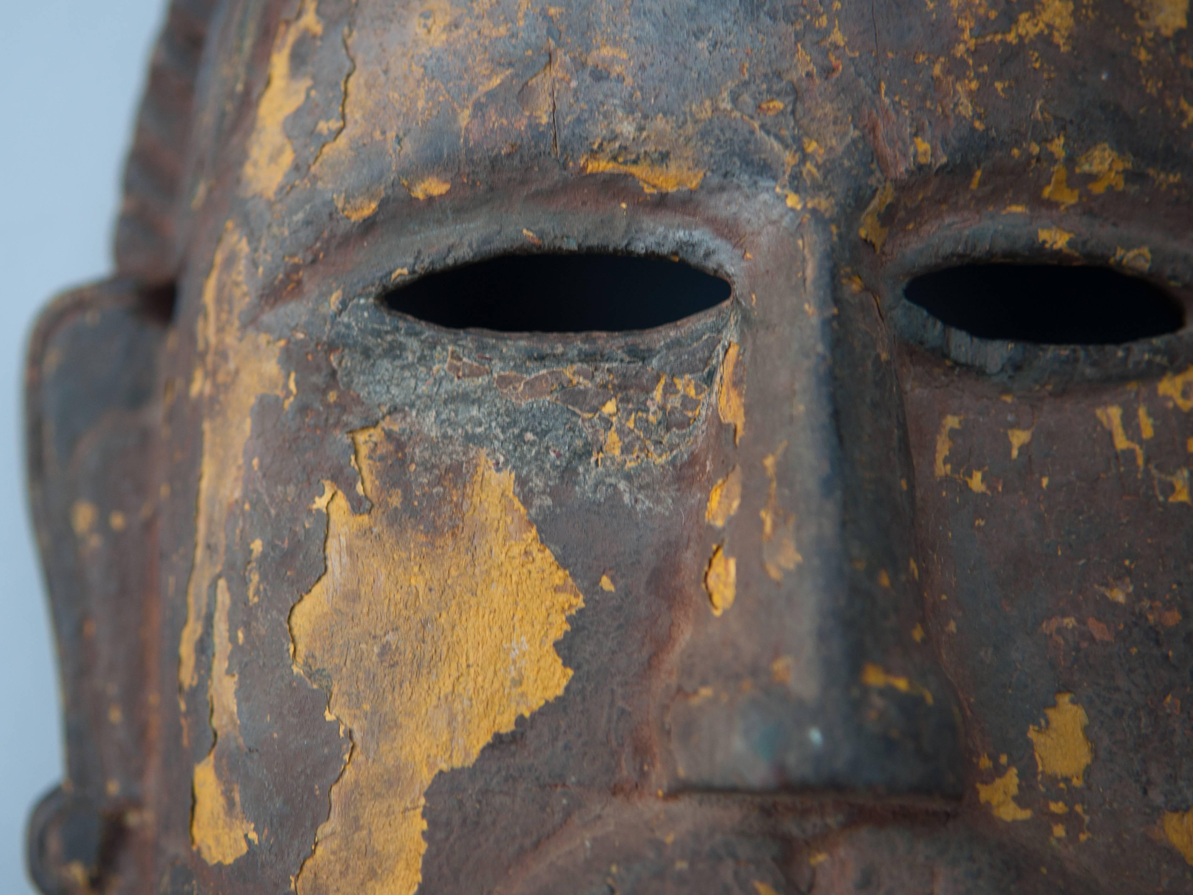 Wooden mask. Tharu of Nepal, early 20th century.
The Tharu people have, since ancient times, been settled in the hills and lowlands of the Terai of Southern Nepal. Fear of disease, in particular malaria, against which the Tharu developed a degree of