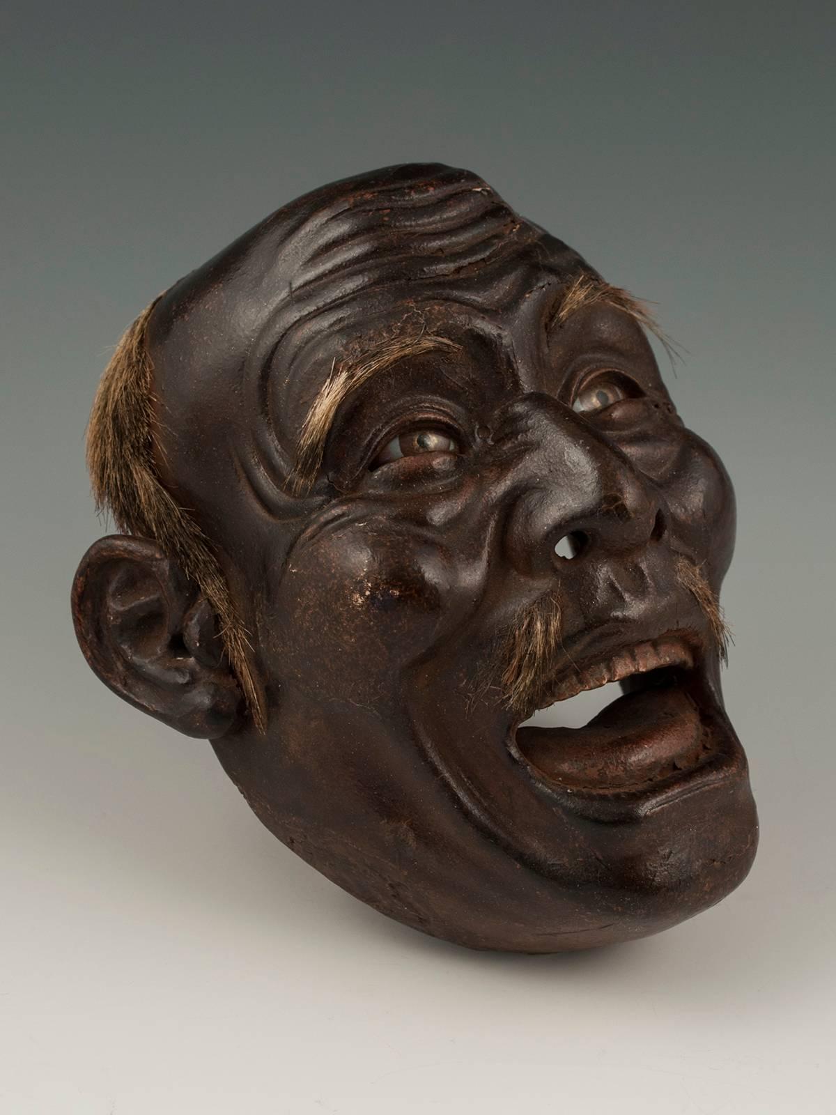 Offered by Zena Kruzick
Iki Ningyo Face, Meiji Period, Japan
paper mâché, gofun, paint, glass eyes, animal hair 

An especially expressive example of iki-ningyo (living doll) from Japan. This was a cultural phenomenon in the evolution of