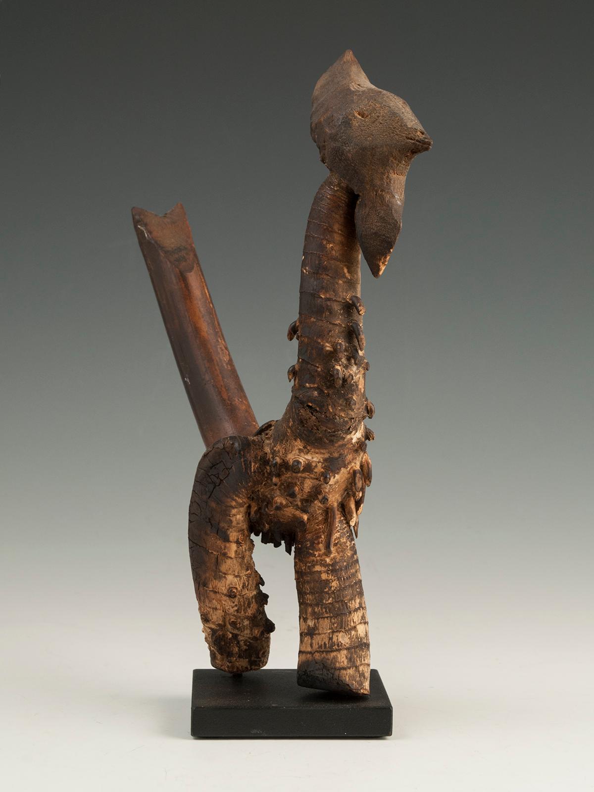 Early to mid-20th century bamboo rooster effigy, Terai, Nepal.

A charming rooster made from the root of a bamboo from the Rai people of Terai, Nepal. He stands 8