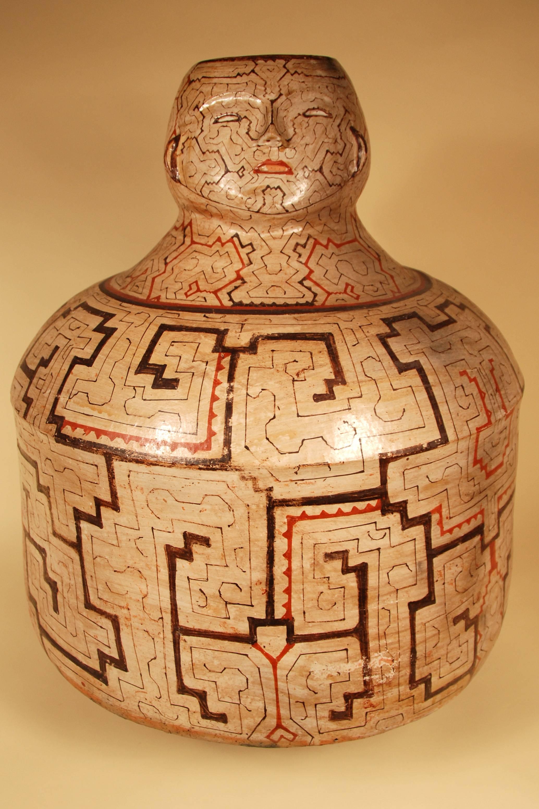 Mid-20th Century Shipibo South American Double Faced Figurative Ceramic Pot

A traditionally decorated vessel created by the Shipibo people in the Peruvian Amazon. Natural pigments and a bold, unique, geometric design result in a striking, handsome
