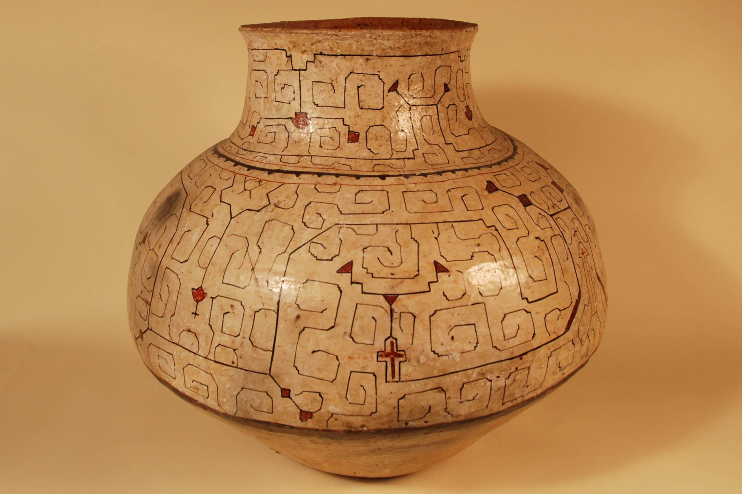 Offered by Callie Morgan Oakes
Mid-20th century large tribal ceramic pot from the Shipibo culture Peruvian Amazon

Hand built, low fired, with natural pigments and a natural resin glaze. This vessel was produced to contain food. The bowl would be