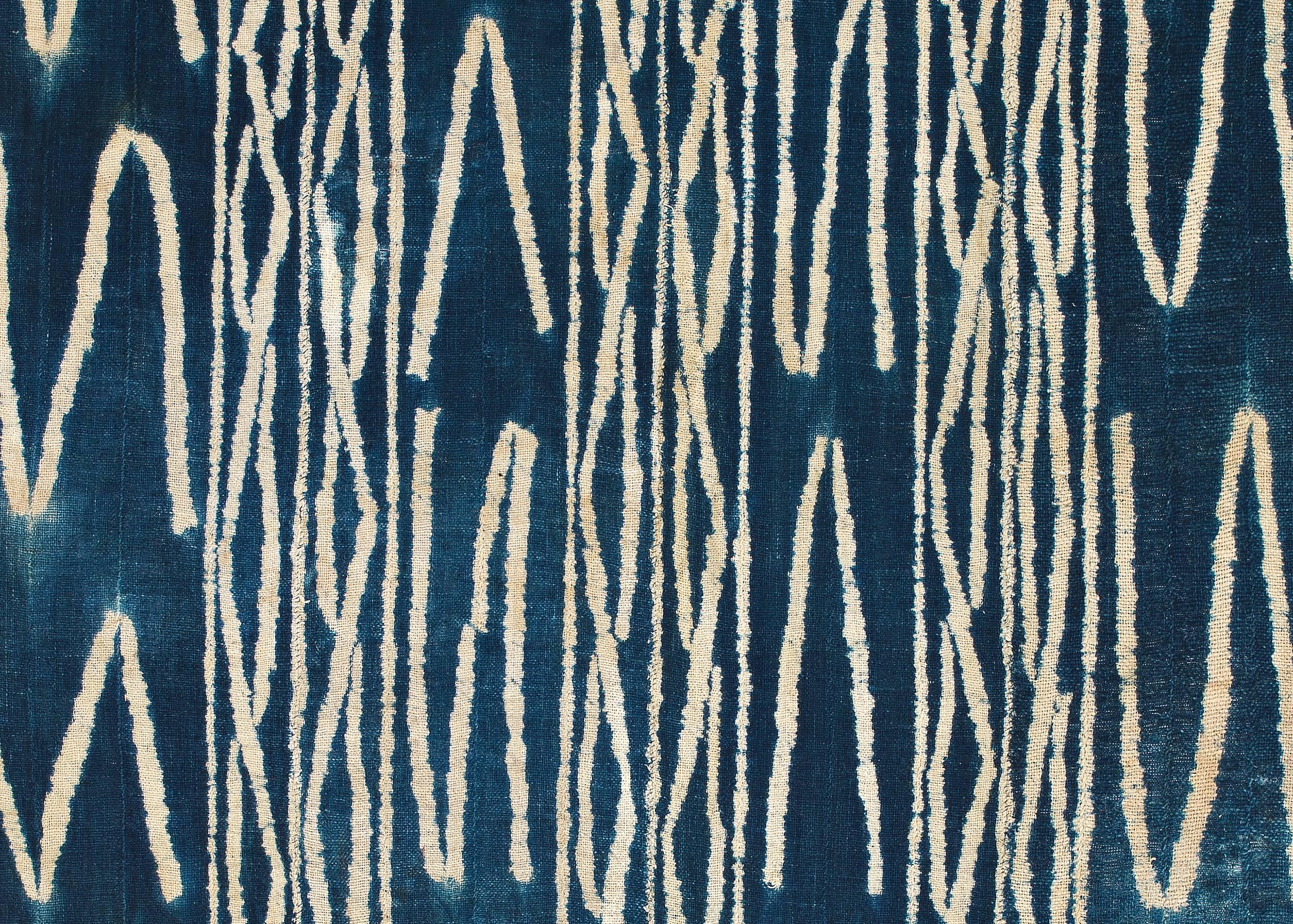 Offered by ANDRES MORAGA
Ceremonial strip-woven display textile from the Bamun or Bamileke people of Cameroon
It was used as a backdrop for ritual and festival dances.
Originally the textile had more strips making it wider. 