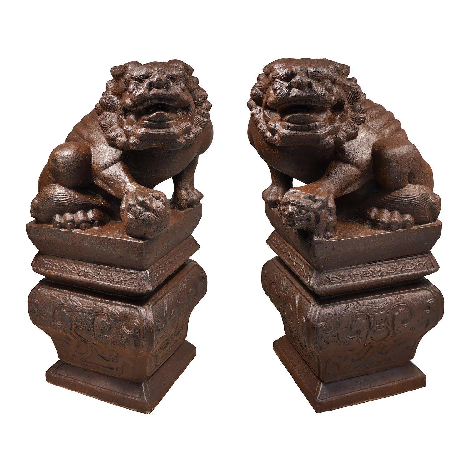 Mid 20th C. or Earlier

Cast iron

Dimensions: 32.5 × 15 × 15 in. (each) / 83 × 38 × 38 cm

Weight: 250 lbs/114 kg each. Because these items are very heavy, they will need to be crated prior to shipping. 

The male has his paw on a ball, which is a