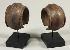 Early 20th Century Fine Cast Pair of West African Bronze Bracelets on Base