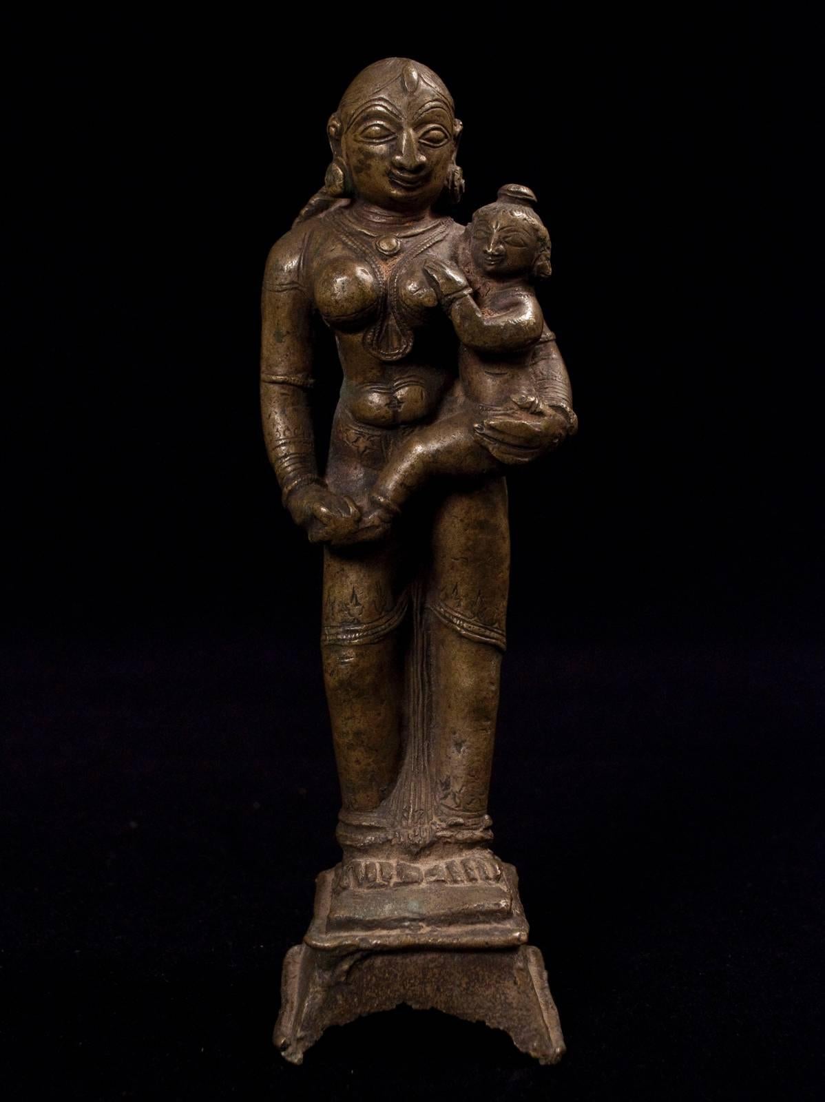 Offered by Zena Kruzick.
17th century lost wax cast bronze Parvati with Child, India.

