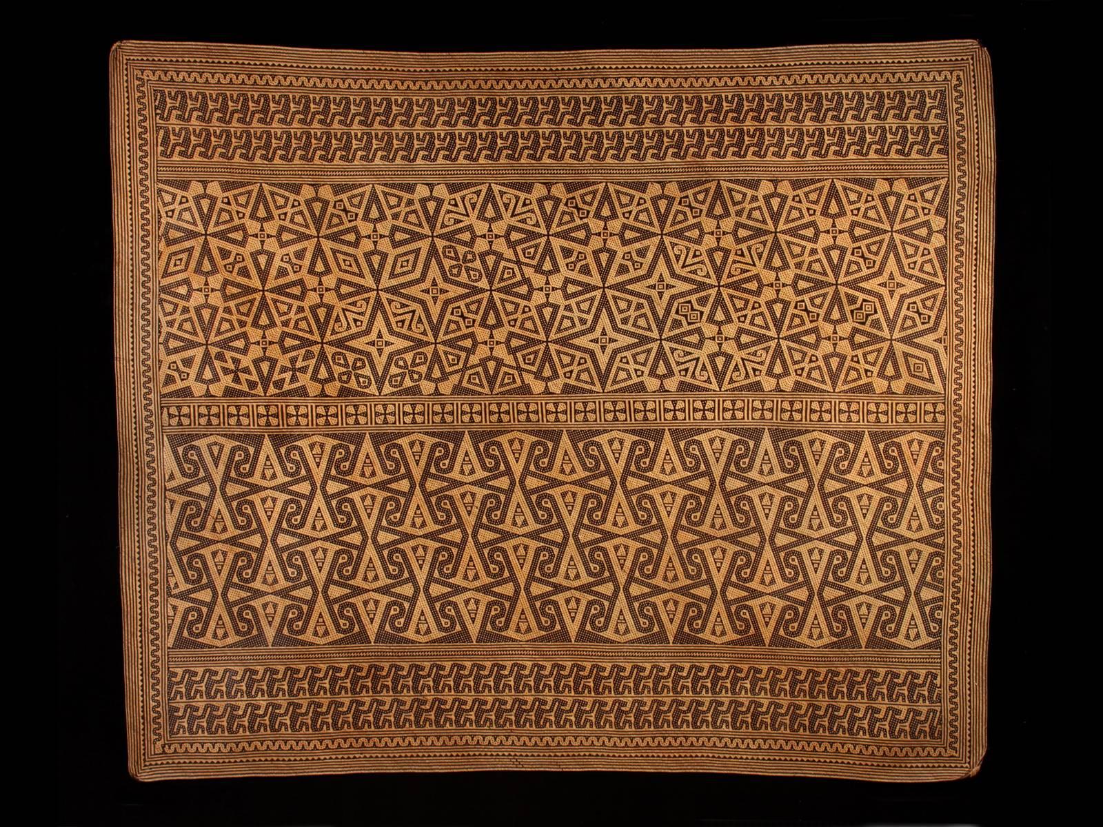 Offered by Zena Kruzick
Early to mid-20th century tribal ceremonial rattan wedding mat (Tikar Adat)
Dayak, Punan people, Kalimantan, Borneo

The Escher-like monkey/dog borders on this visually engaging sleeping mat hint at the complexity of the