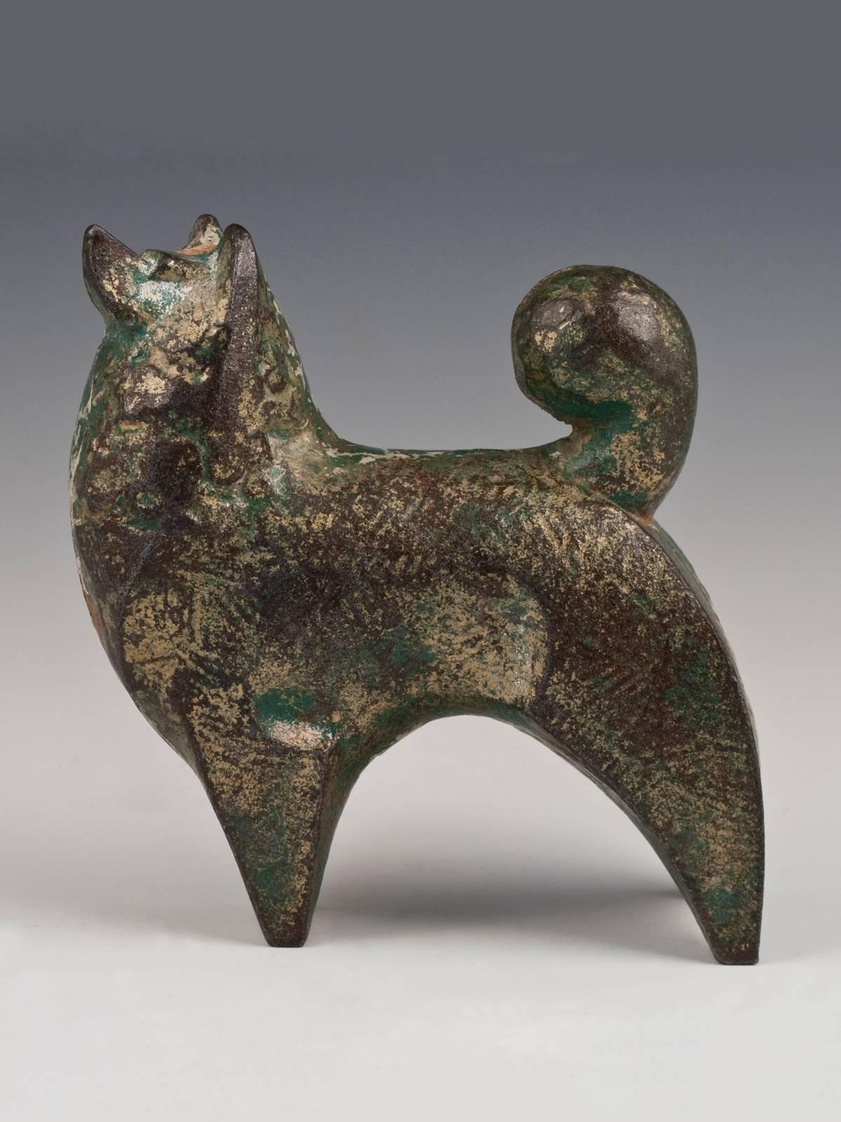 Offered by ZENA KRUZICK
Mid-Century Modern Akita Dog Okimono Sculpture, Japan

Last year, a small group of cast iron animals was found in a burlap bag in a rural peddler's one-room home in Southwest China. Because of the language barrier, no