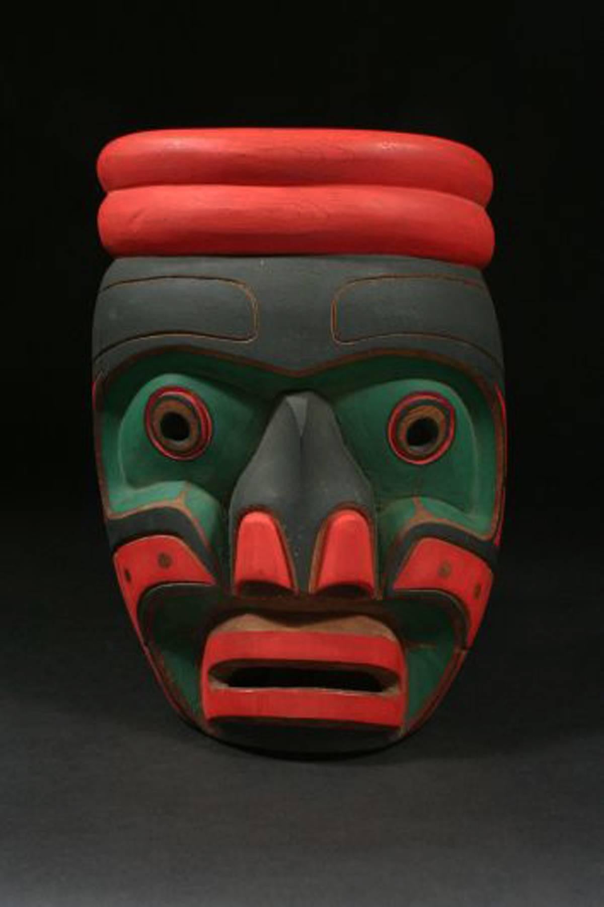 20th Century North West Coast Mask Stan Hunt Signed 

A striking, graphic mask in the immediately identifiable North West Coast style. A Classic image rendered with clean lines and bold use of primary colors, creating a compelling mask. Expertly