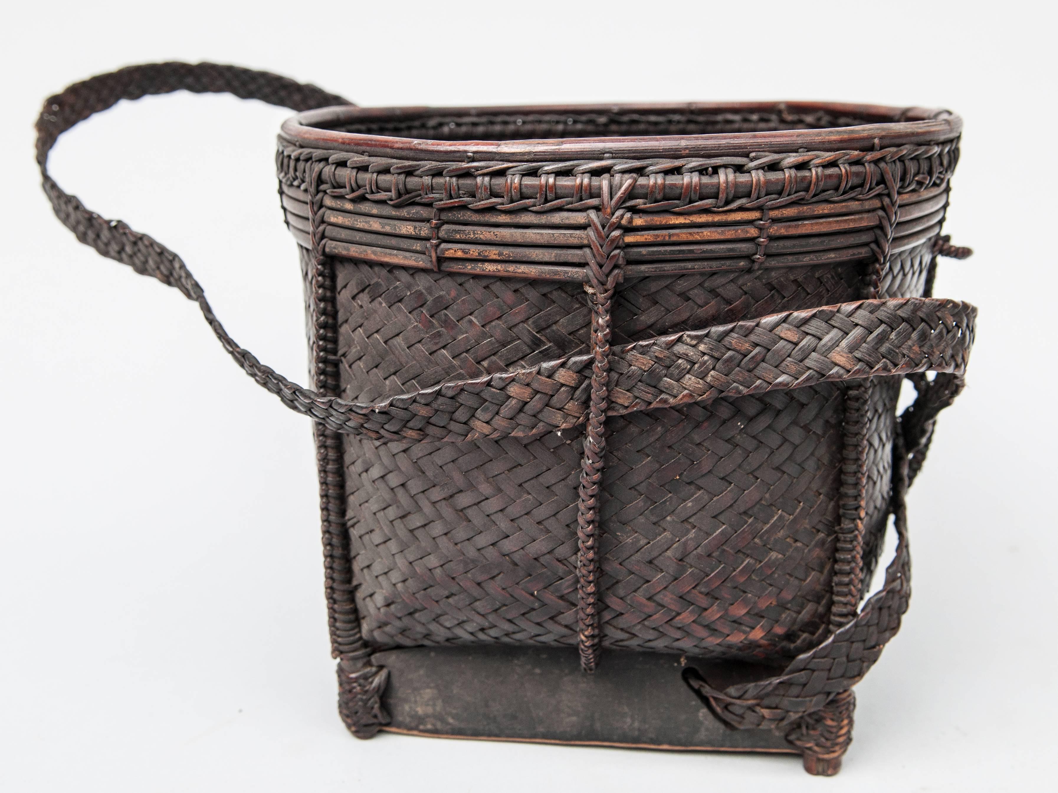 Collecting Basket from Ata Pue area of Laos. Mid-20th Century. Bamboo, Rattan.
Offered by Bo Tree Source.
Finely woven coffee collecting basket from the Ata Pue area of Laos. Mid-20th century. Laotians are widely renowned for the high quality of