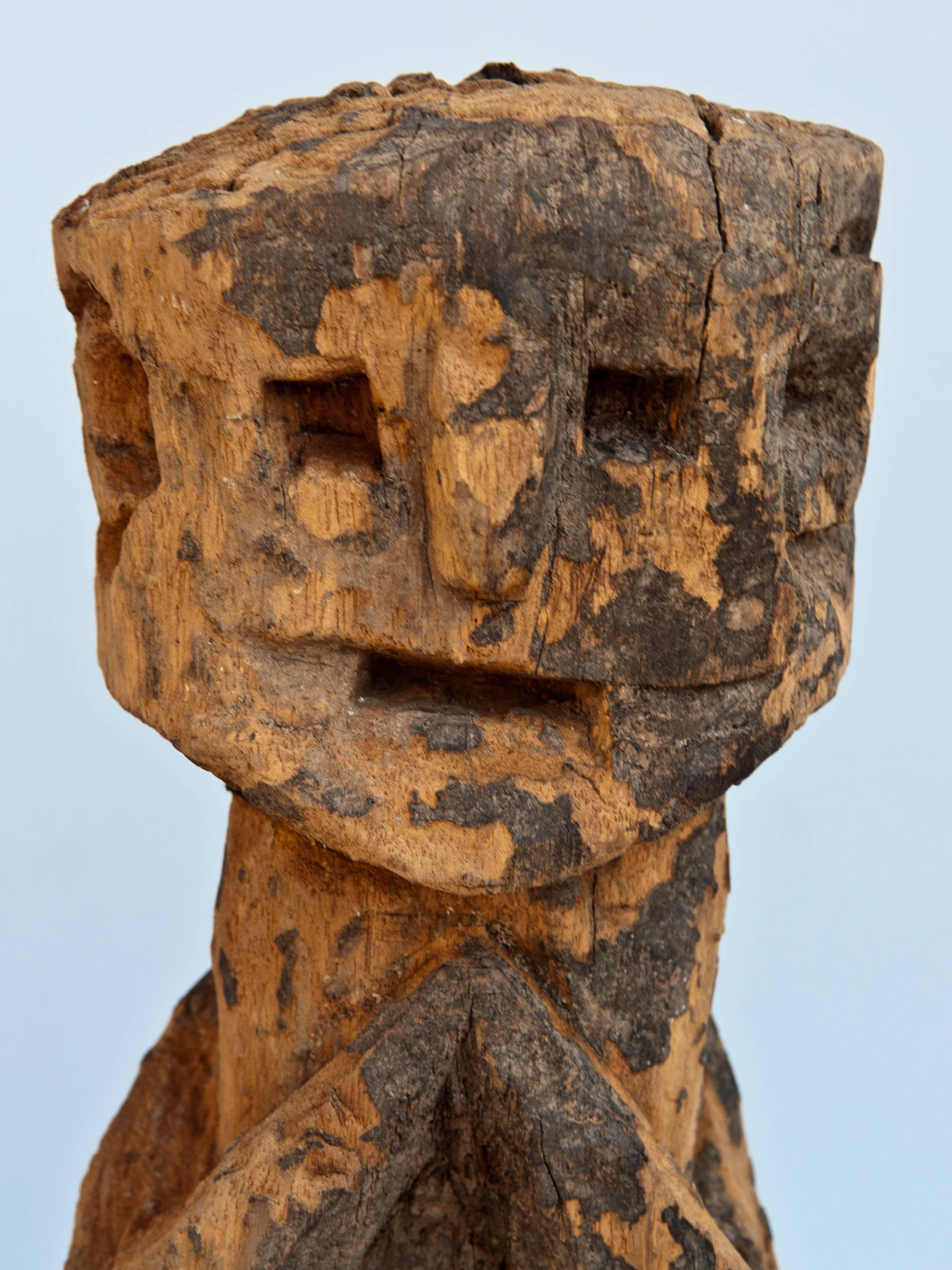 Wooden ancestral figure from West Nepal. Early to mid 20th century. Wooden stand
Wooden ancestral figure from West Nepal, from the early to mid 20th century. This small statue is attributed to the Khas people, an Indo Aryan people of vague and