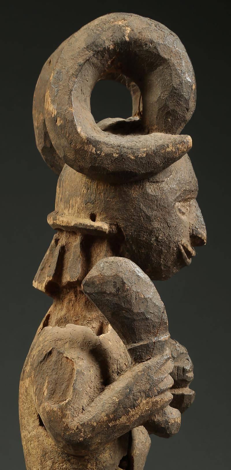 Igbo Tribal Seated Ikenga Figure with Sword and Head Africa, Nigeria In Distressed Condition In Point Richmond, CA