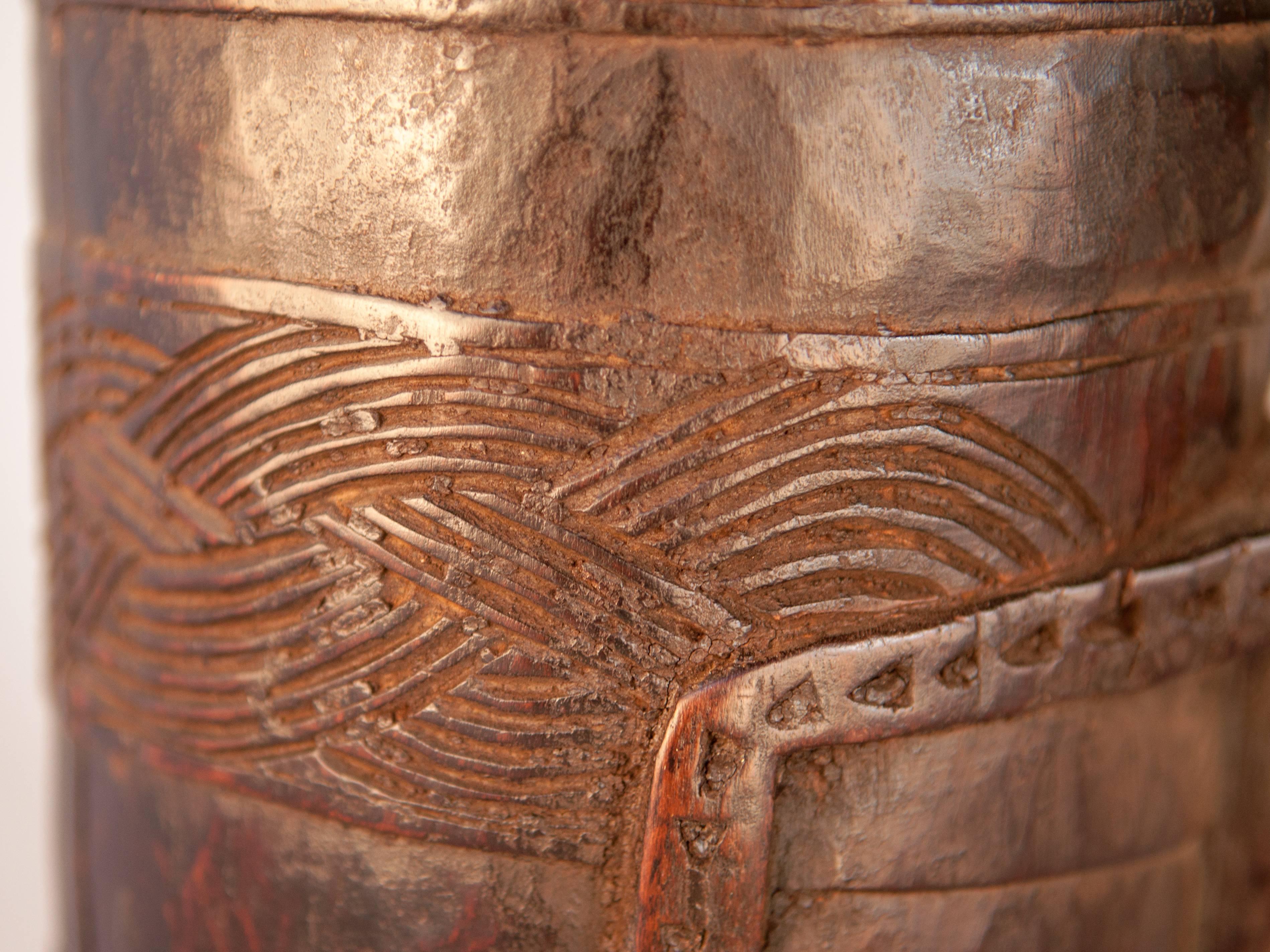 Hand-Carved Wooden Carved Milk Pot with Stylized Monkey Motif. Late 20th Century. West Nepal