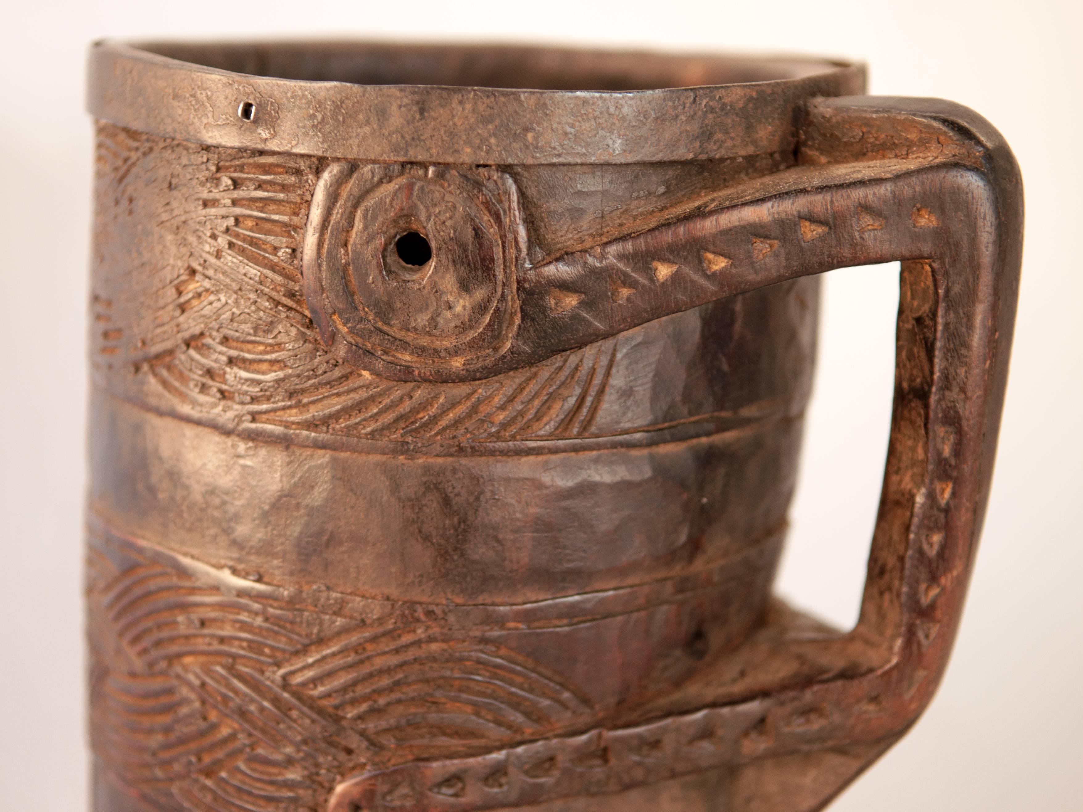 Nepalese Wooden Carved Milk Pot with Stylized Monkey Motif. Late 20th Century. West Nepal