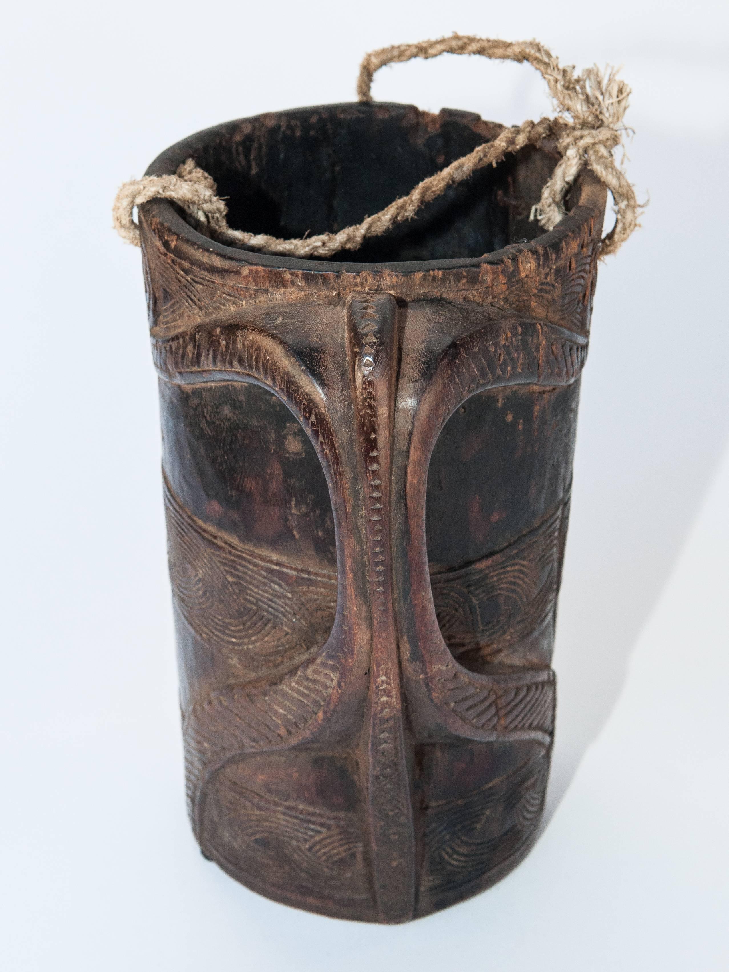 Tribal Wooden Carved Milk Pot Stylized Monkey Motif. Mid-Late 20th Century. West Nepal.