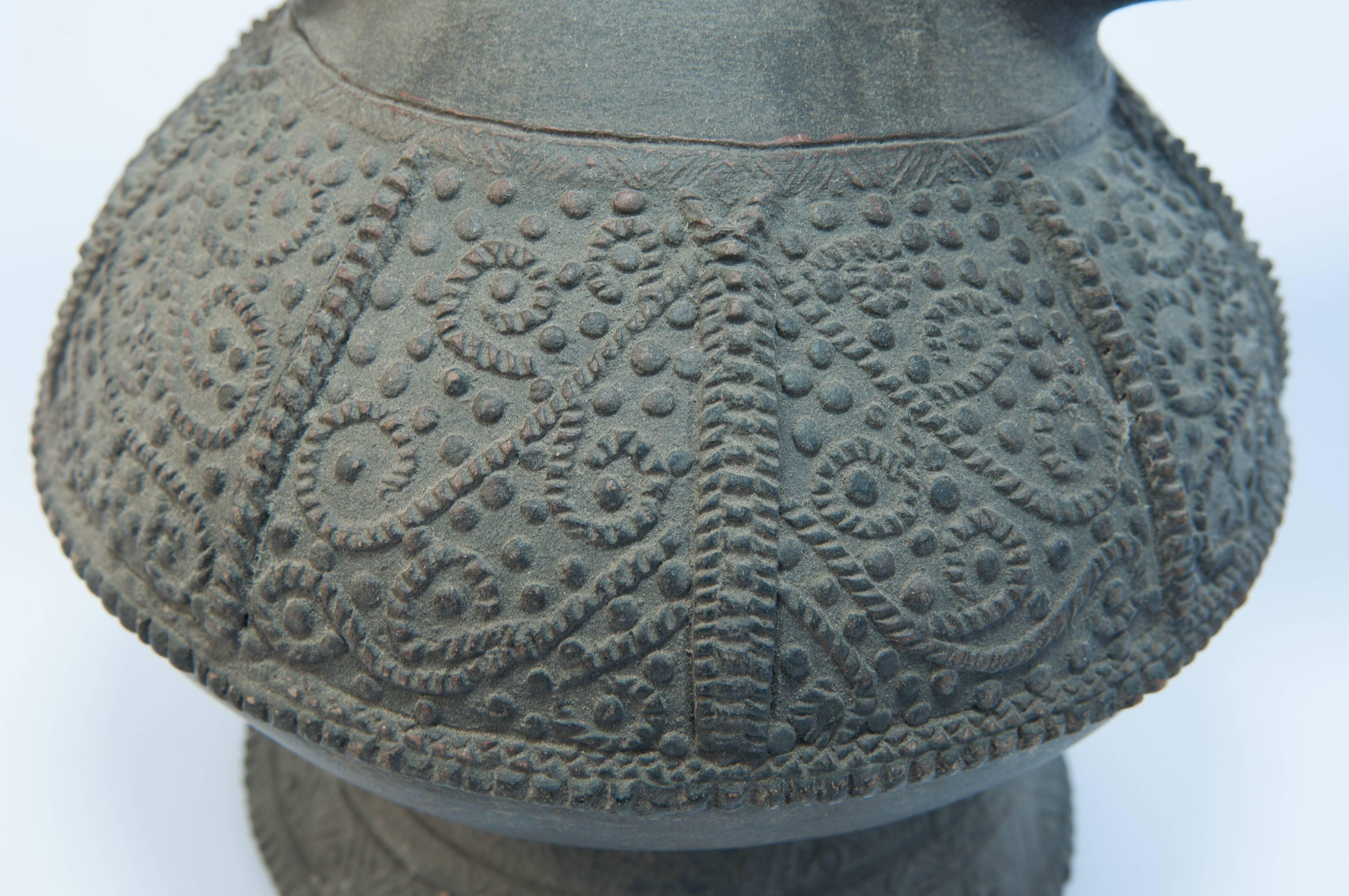 Earthenware Kendi with Raised Design. Lampung Sumatra. Early to Mid-20th Century 1