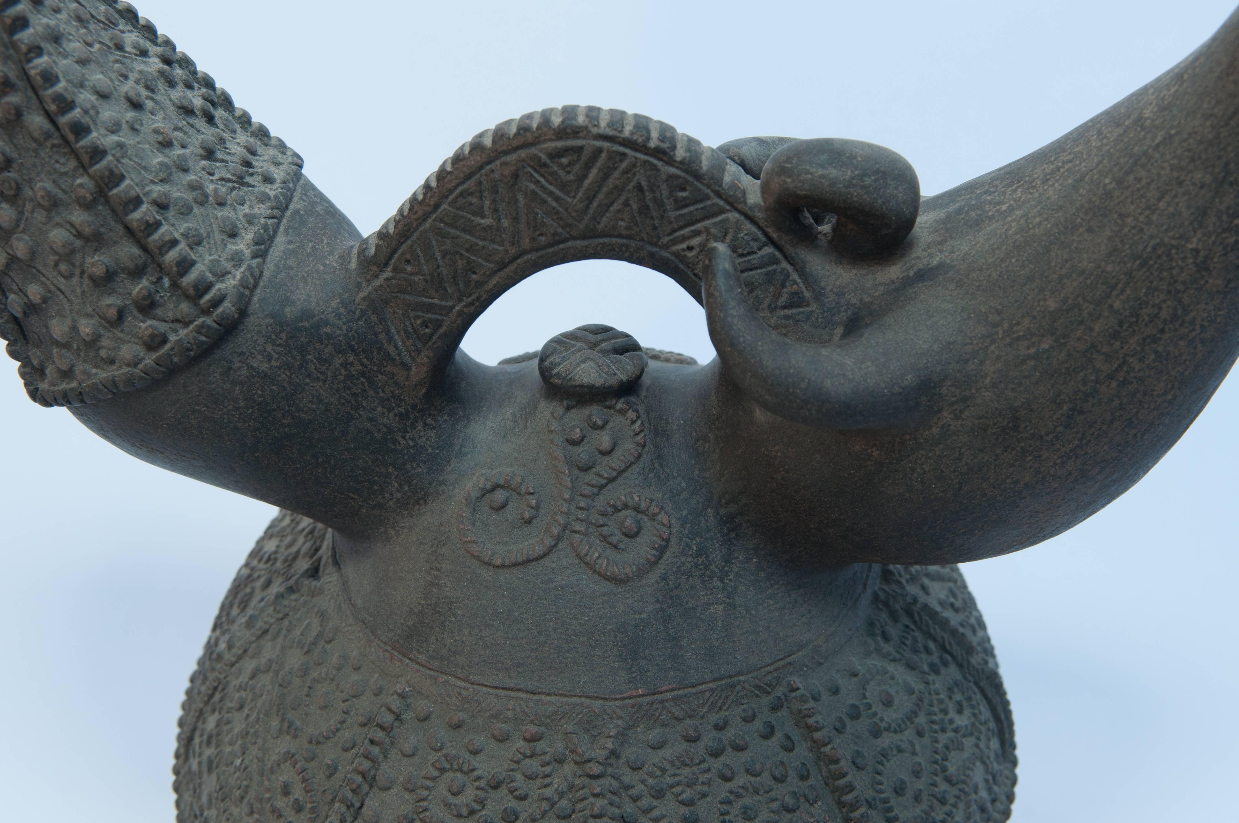 Hand-Crafted Earthenware Kendi with Raised Design. Lampung Sumatra. Early to Mid-20th Century