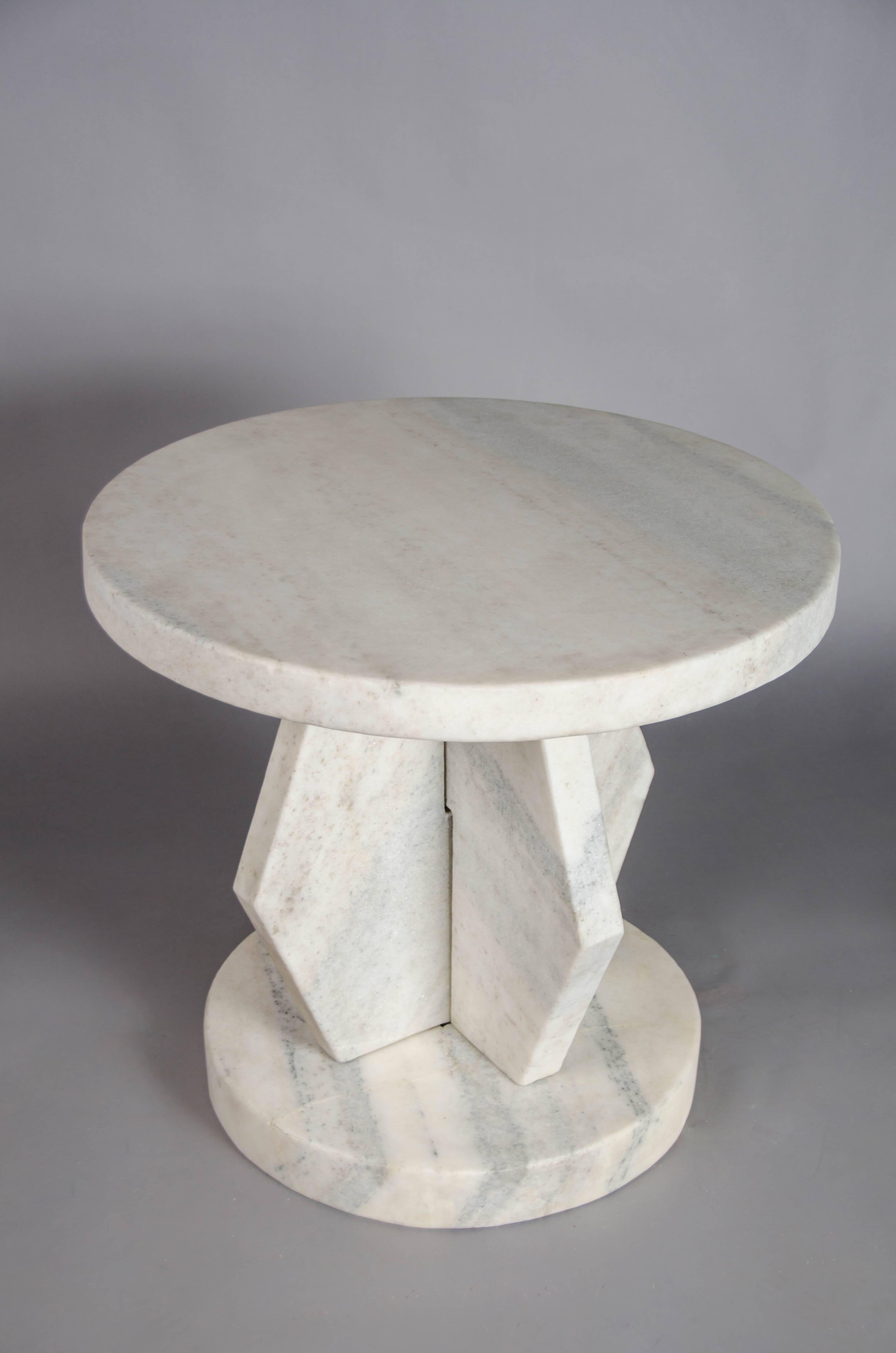 Brancusi design side table
Han Bai Yu (white marble)
Hand-carved
Limited edition
Four stone slab pieces

Stone pieces vary

Tabletop piece 108lbs., 26 3/4” diameter x 2” thick 
Bottom base piece 90lbs, 19 3/4” diameter x 3” thick