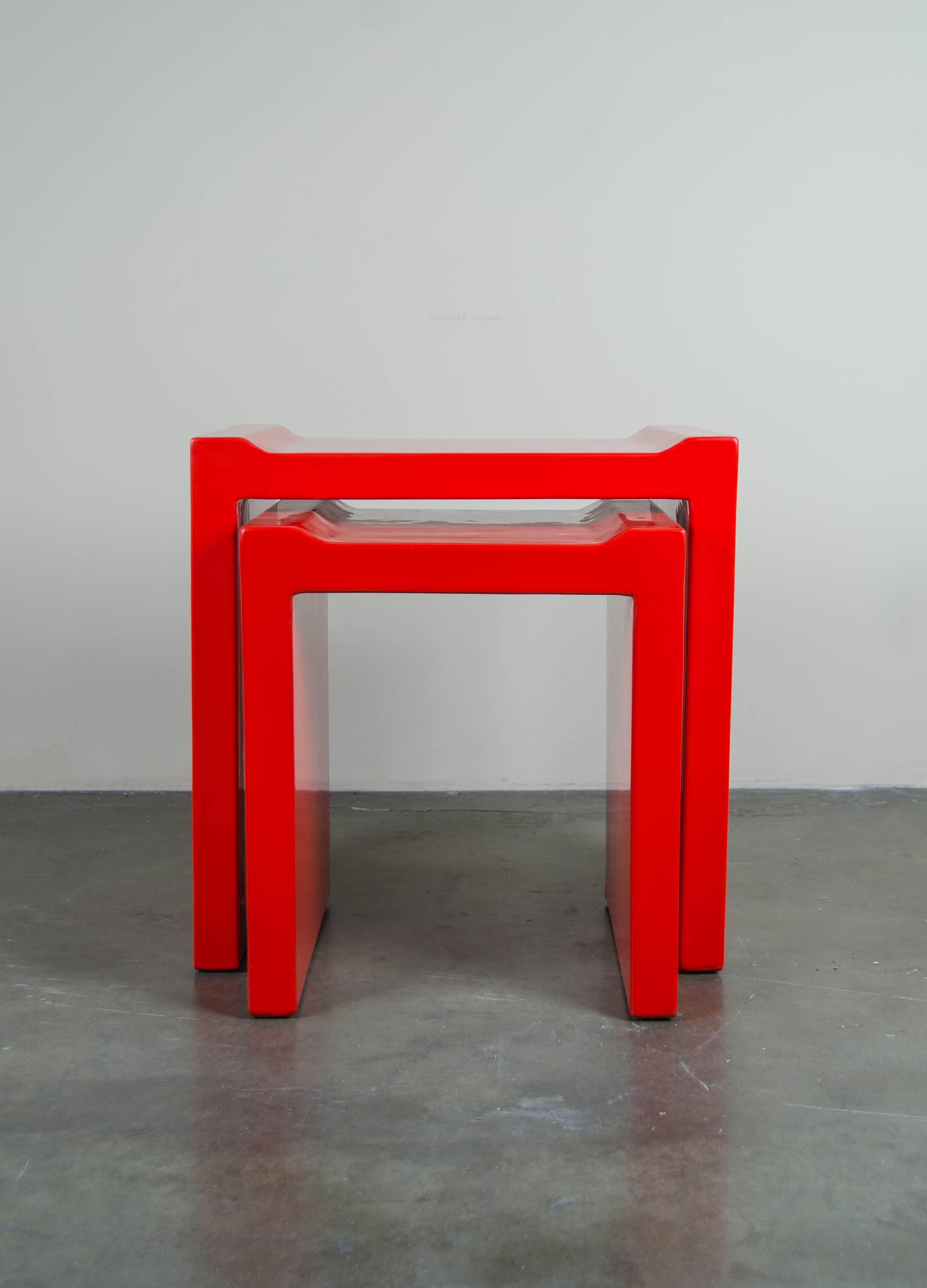 Nesting table with flange corners
Red lacquer
Handmade
Set of two
Limited edition

Measures: Large table: 23