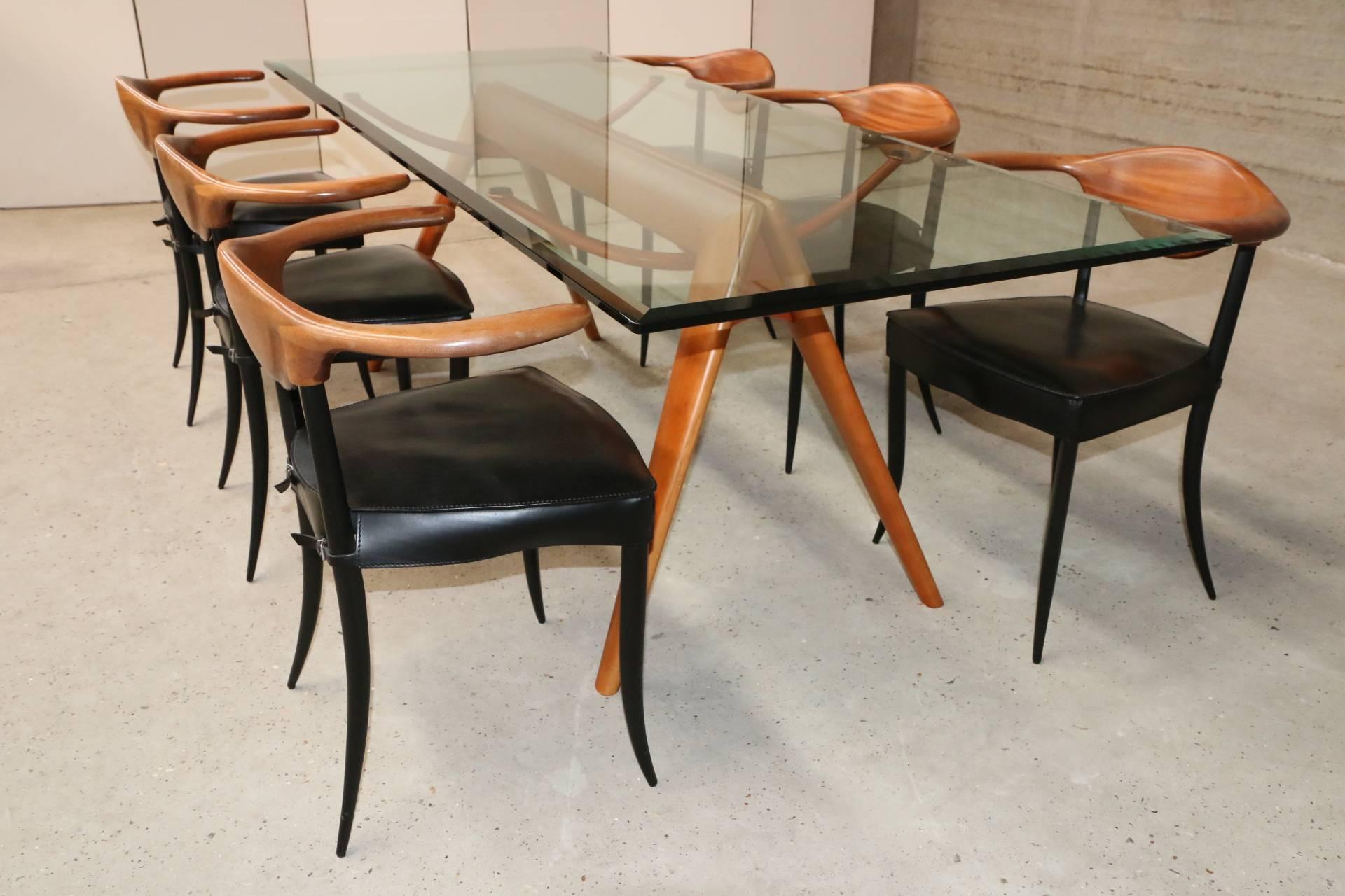 Italian Impressive glass table with wooden base and six cowhorn chairs, Italy
