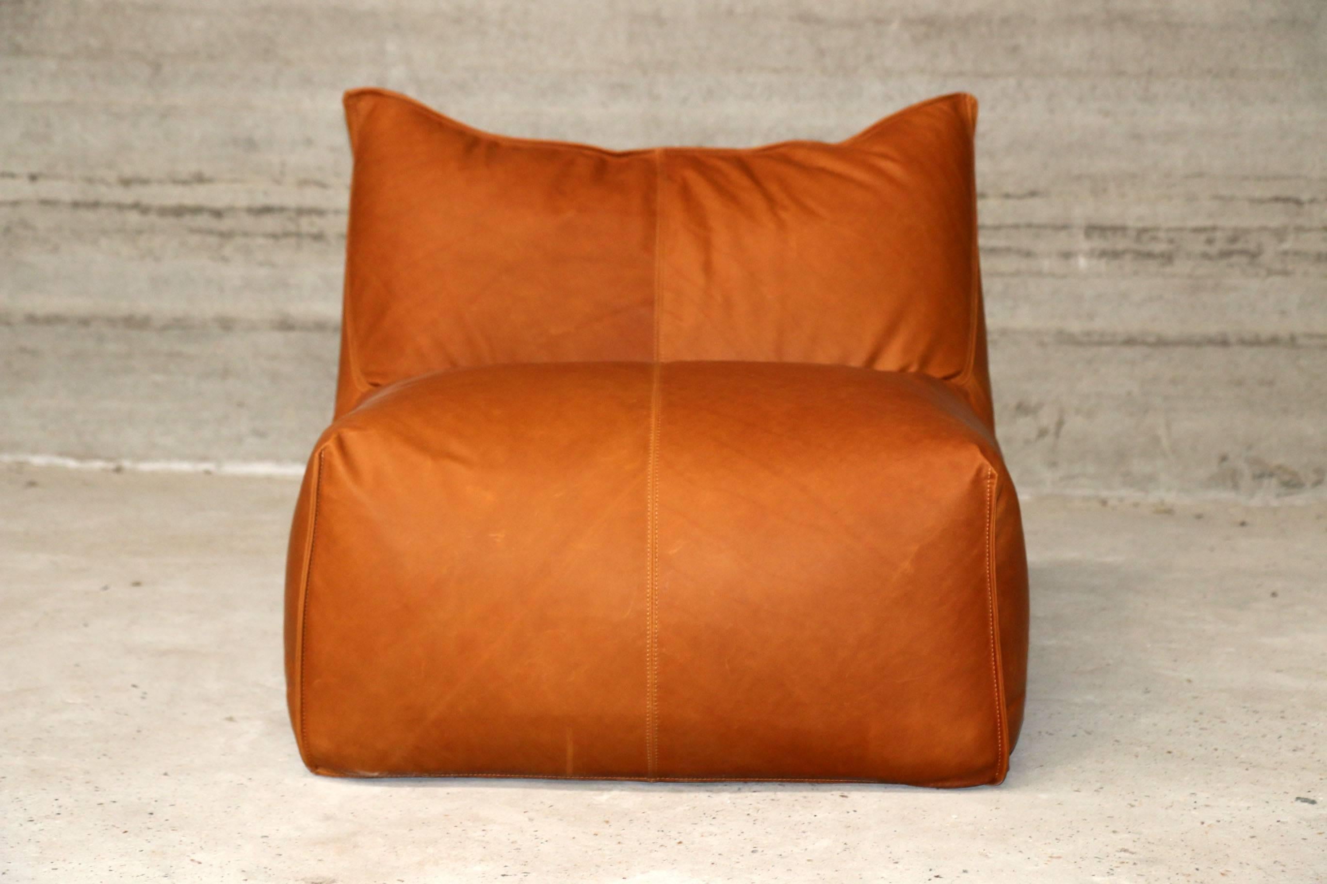 New upholstered bambole lounge chair, full grain cognac leather, no armrest, designed in 1972 by Mario Bellini.