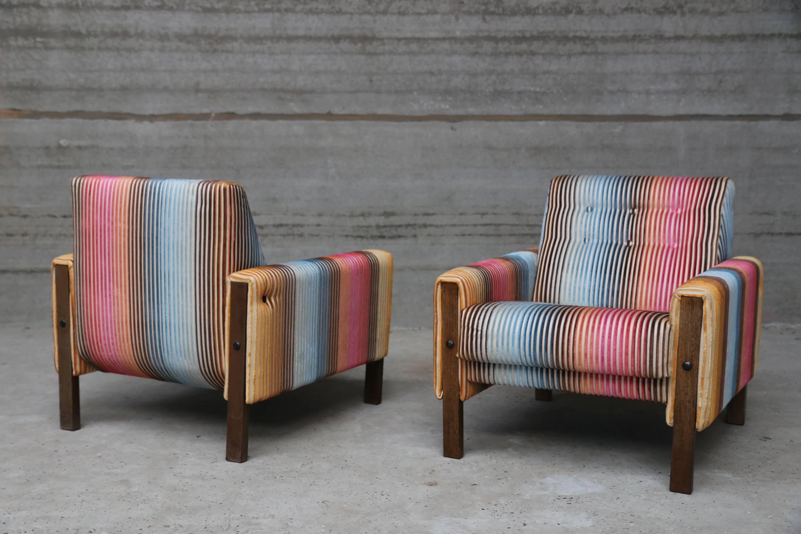 These two comfortable armchairs were re-upholstered in original Missoni fabric. Stunning colours and very high quality.
 