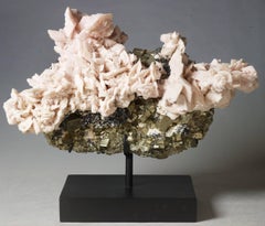 Manganocalcite over Pyrite Crystals