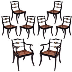 Set of Eight Regency Black Lacquer Gilt-Brass Mounted Klismos Dining Chairs