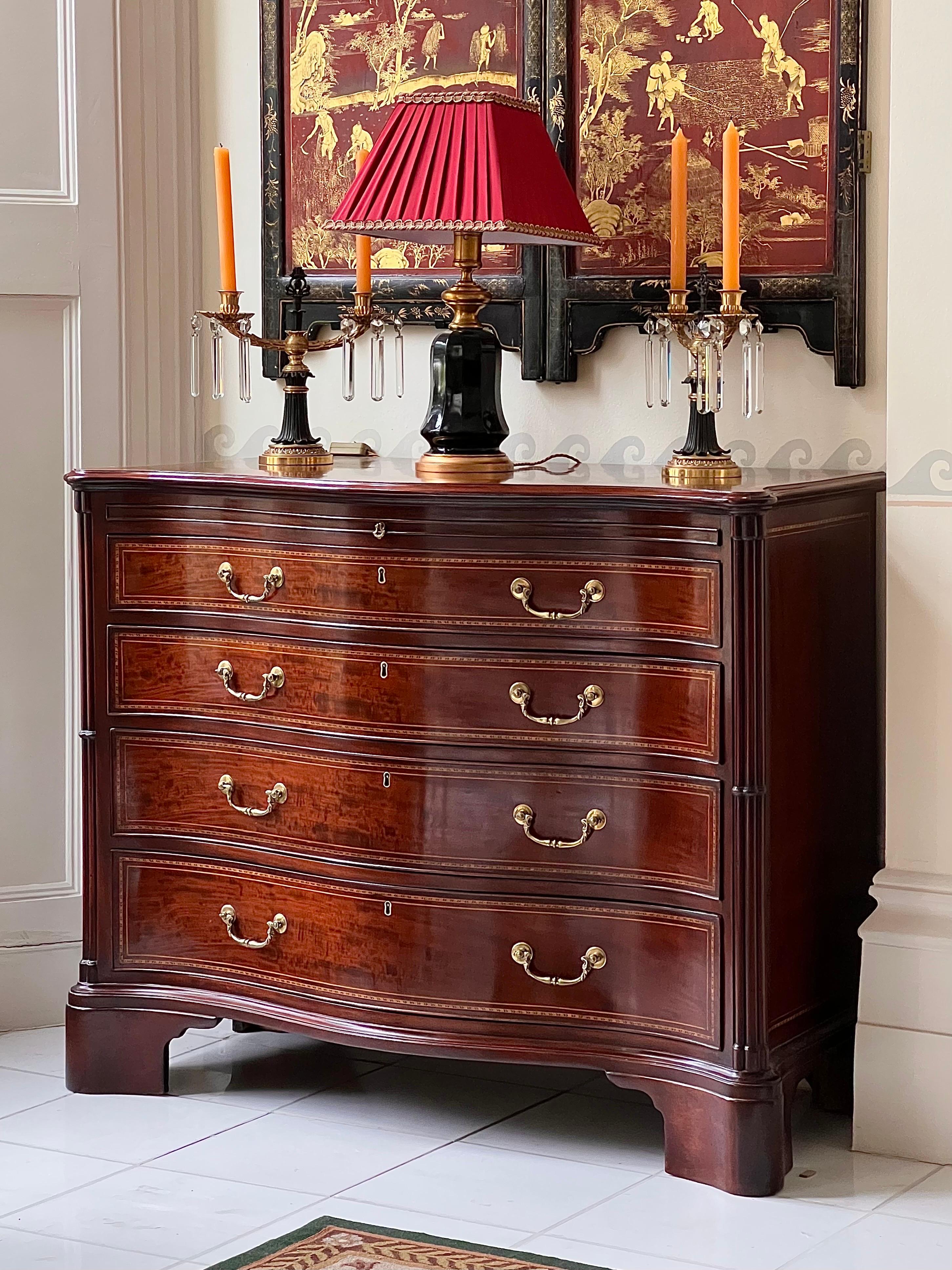 A superb quality George III Chippendale period serpentine-fronted chest of drawers.
English, c. 1770.

Why we like it
A most perfect embodiment of the Chippendale taste: superb quality, dramatically figured veneers and subtle decoration throughout.