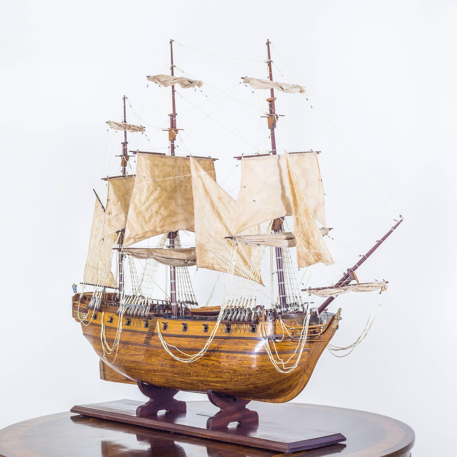 A superb finely detailed large scale model of the famous 6th Rate 24-Gun Frigate HMS Pandora, 1779.

English, early 20th century.

Handcrafted of satinwood, boxwood, mahogany, holly and other fine timbers with a stunning attention to detail.