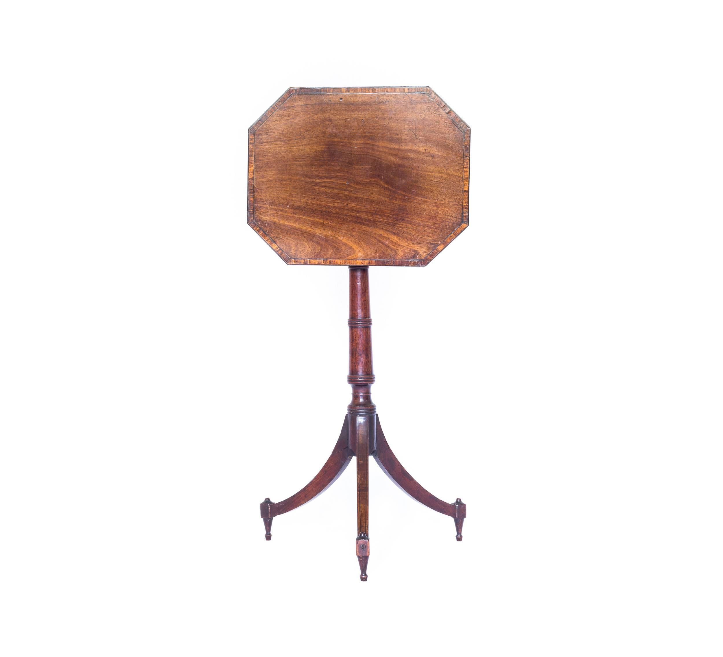 An unusual George III Sheraton period small telescopic table in mahogany, adjustable in height, of particularly elegant design, closely related to the Gillows sketch, dated 1792. English, c. 1790's

This delightful little telescopic table has the