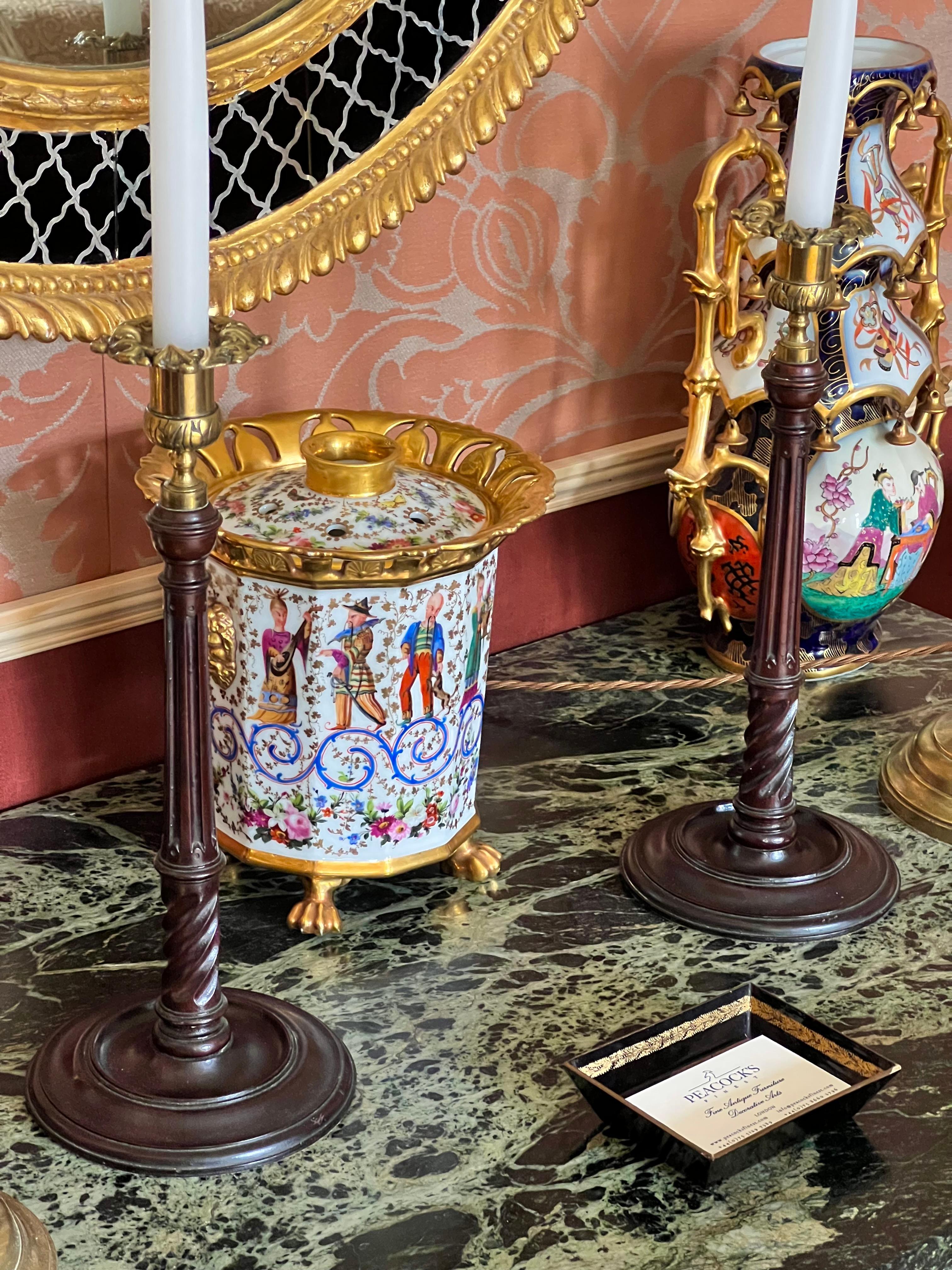 Pair of 18th Century Mahogany Candlesticks. England, circa 1770.

Why we like them

Glorious example of 18th century craftsmanship. Superb colour, original surface, beautifully drawn model & exquisitely carved.

Dimensions

Width: 14 cm /