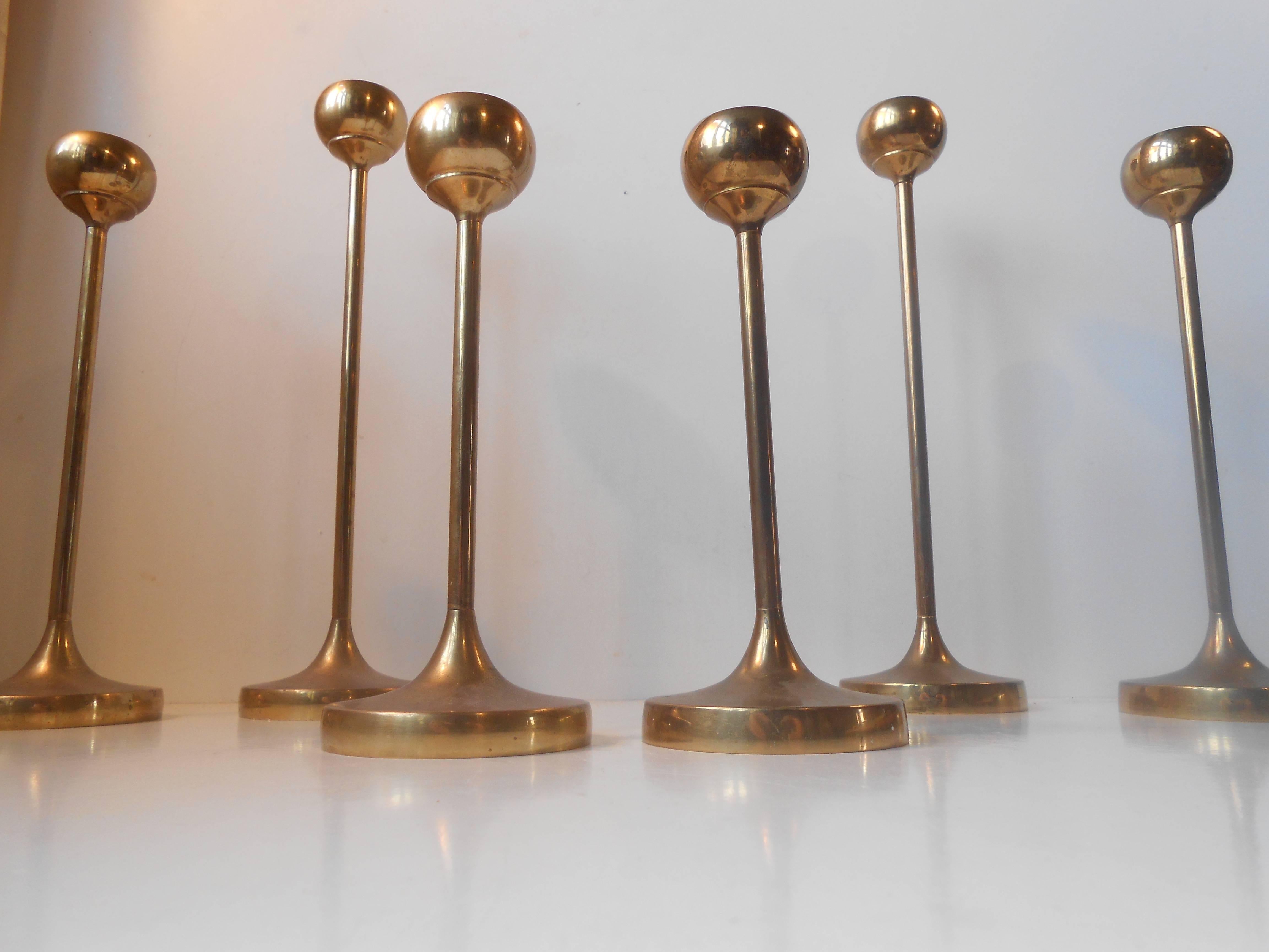 Set of six brass tulip candle holders / or three pairs in different heights: approx. 8
