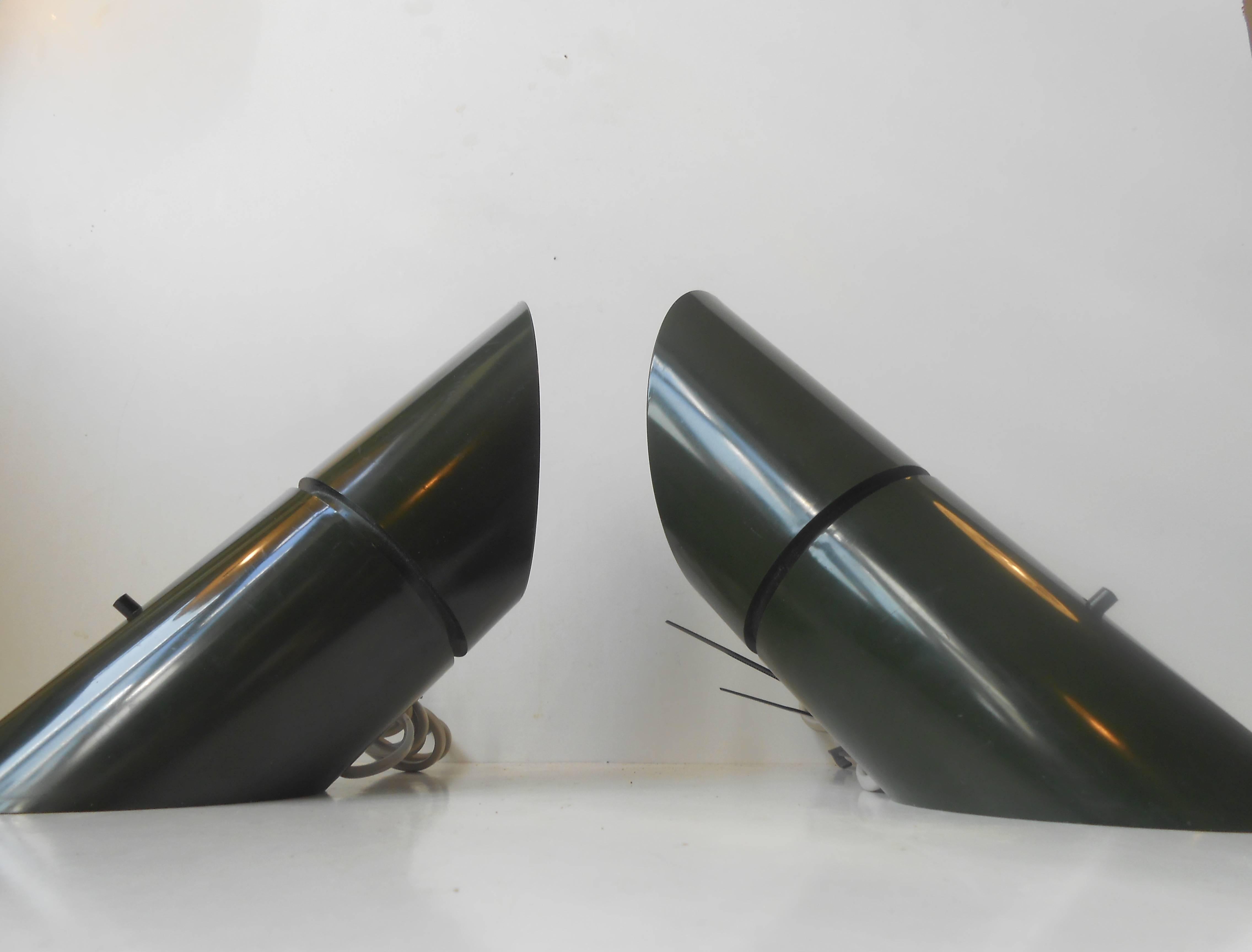 Pair of wall lights, 'Phister' by Hans Due for Fog & Mørup, Denmark, 1977. Dark green plastic with rotating 'Heads,' that allows you to direct the light as desired. Can be used as table lamps as well. Measurements: L/H 11 inches, D 4 inches.