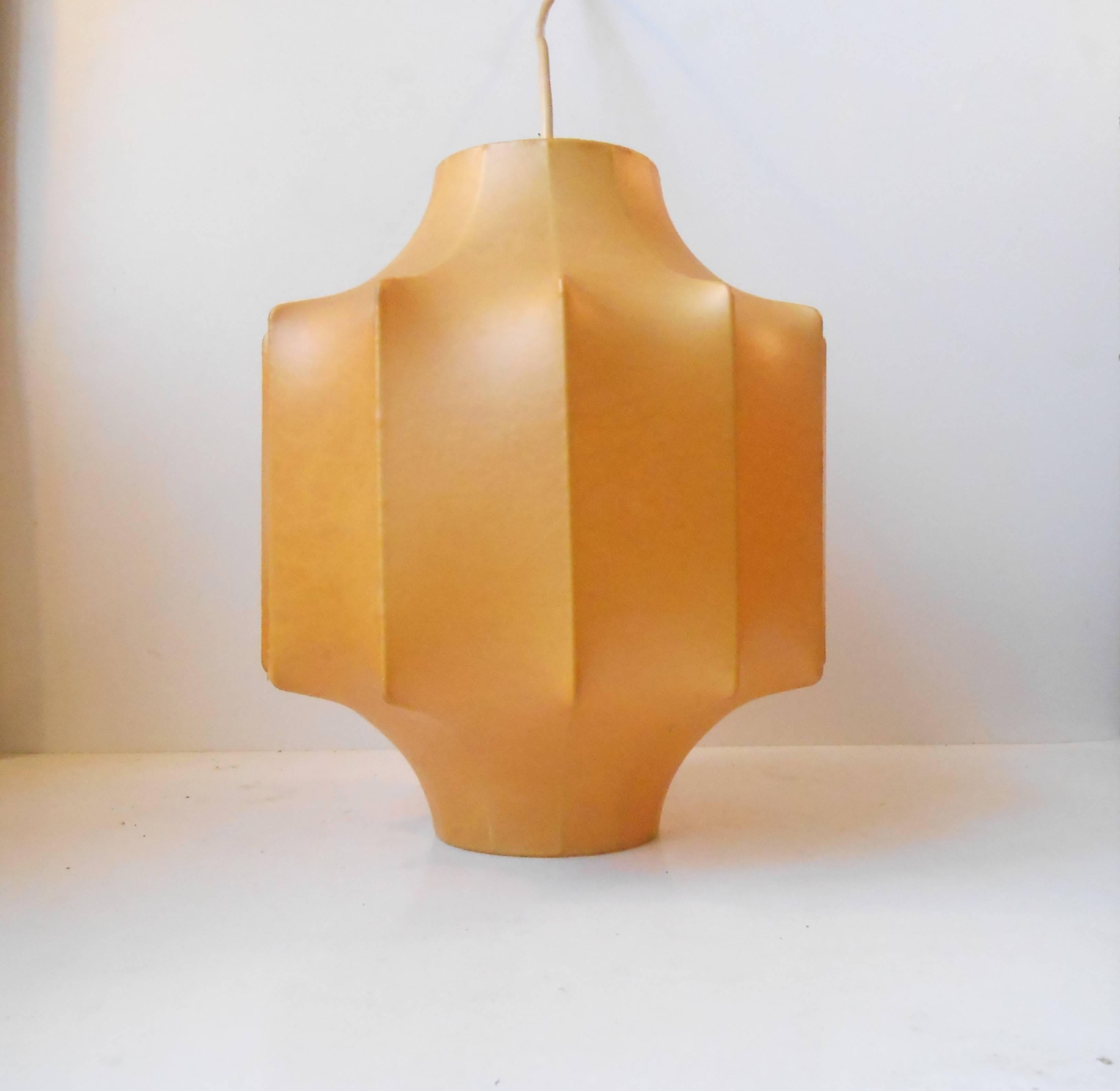 Rare Italian pendant lamp made of soft plastic coating applied on metal frame. An invention of Arturo Eisenkeil from Merano that manifested the Flos Lightning Company internationally.

Measurements: H: 12 inches (30 cm), D: 10 inches (25 cm). Once