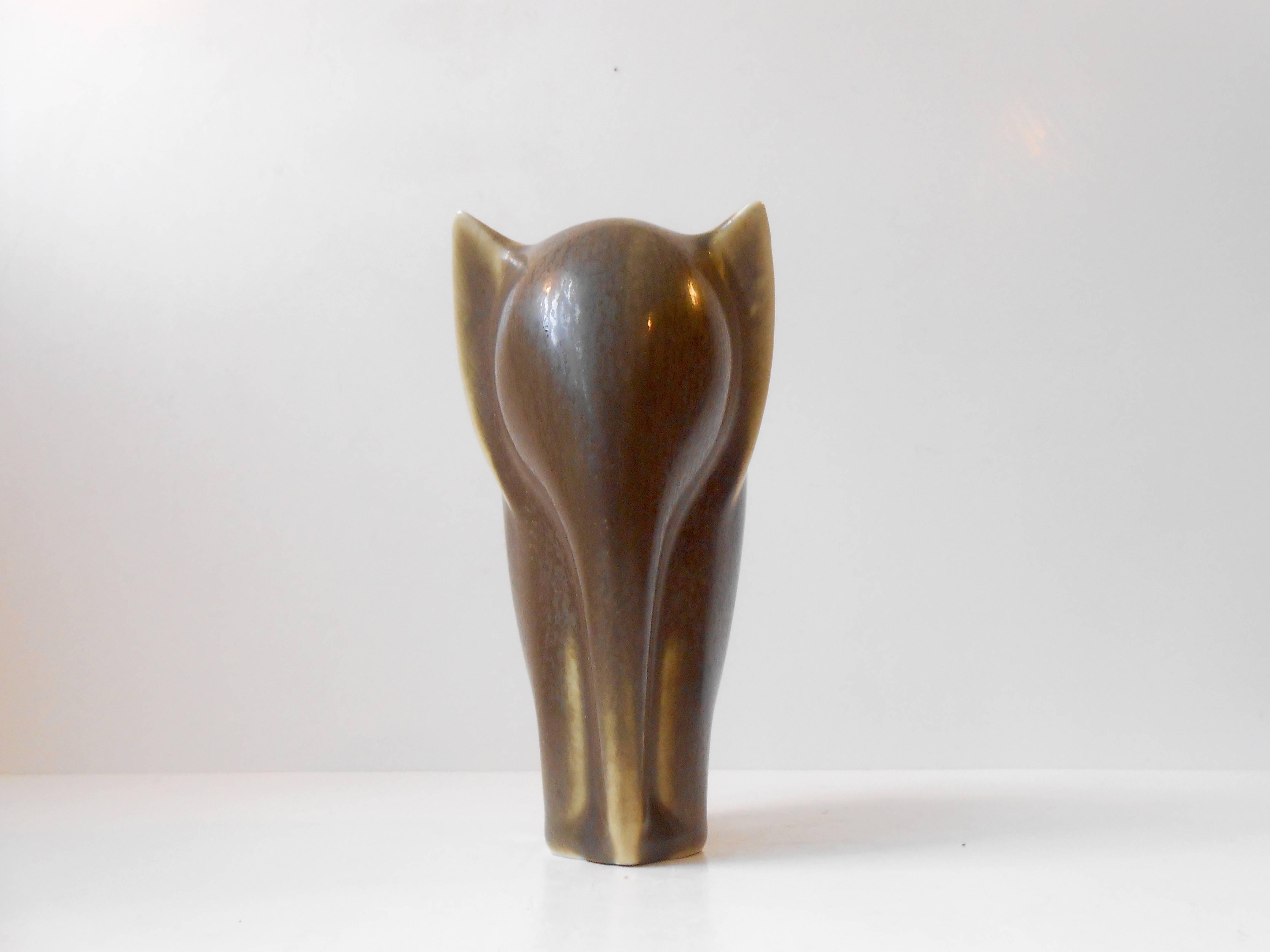 Ceramic elephant in brown/greenish Hares-fur glaze by Danish ceramist Kjeld Jordan for Palshus. Stamped: KJ - Palshus, Denmark. Measurements: H: 5 inches (12,5 cm). Condition: Mint.