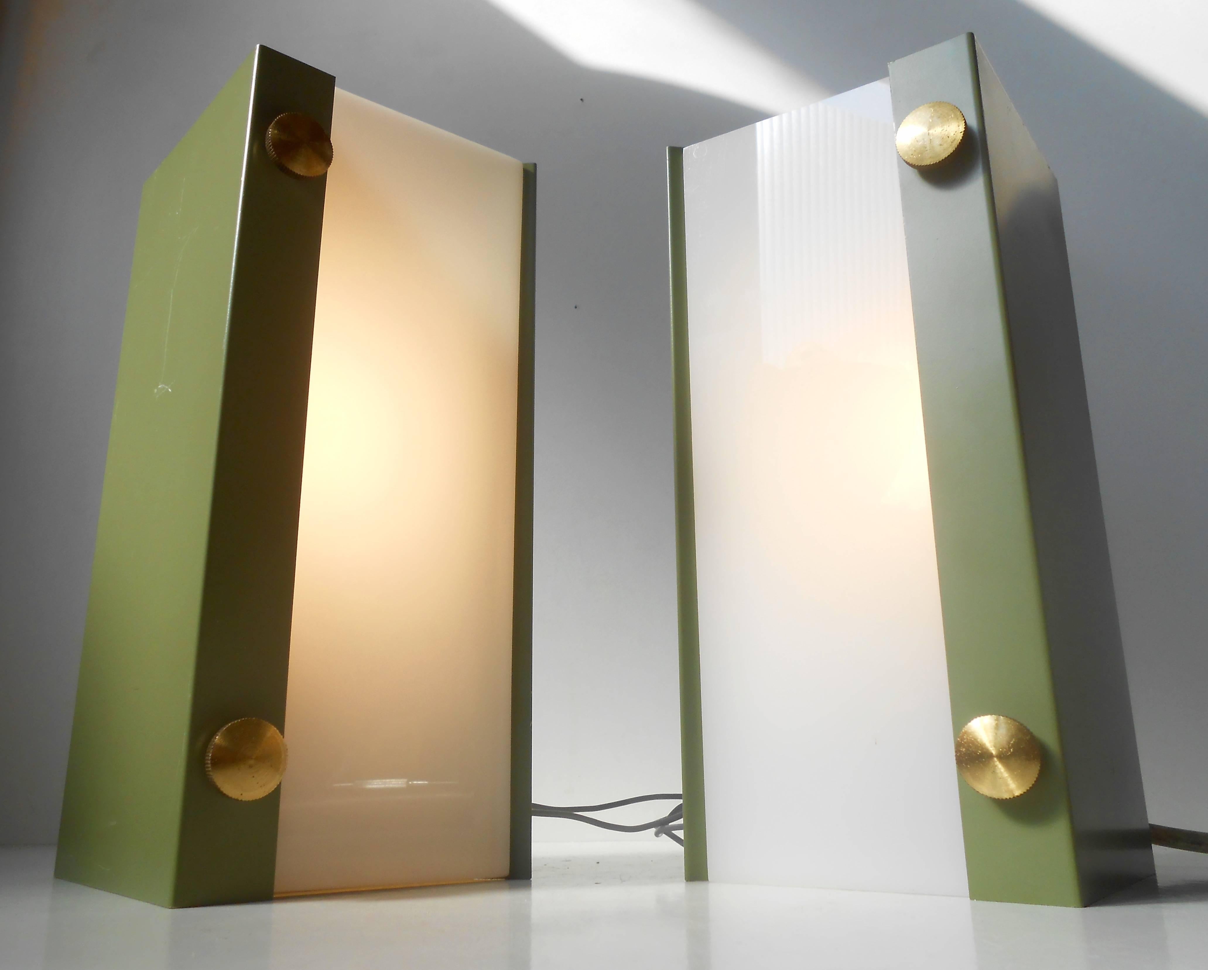 Simplistically designed wall lamps with light green powder coated aluminium exterior, large brass screws and fluorescent acrylic shades. Anonymous Scandinavian maker/design, circa 1960-1970. Measurements: W/H/L: 9,25 inches (24 cm), W/H/L: 6 inches