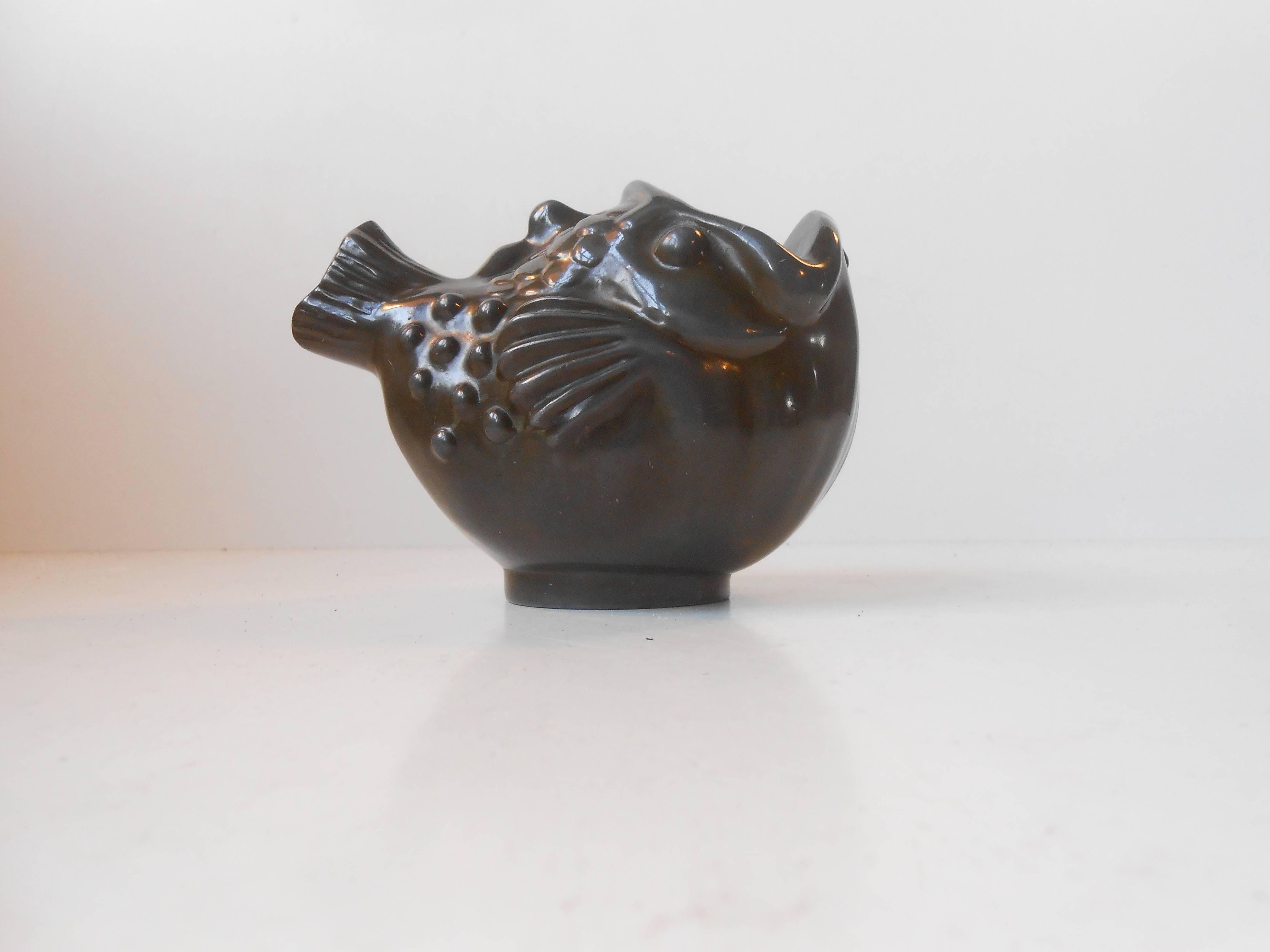 Beautifull little chubby fish-vase by Just Andersen. Made of his own invention, disko metal. Stamped: Just, Denmark, circa 1389. Measurements: Length 5 inches, height 4 inches.