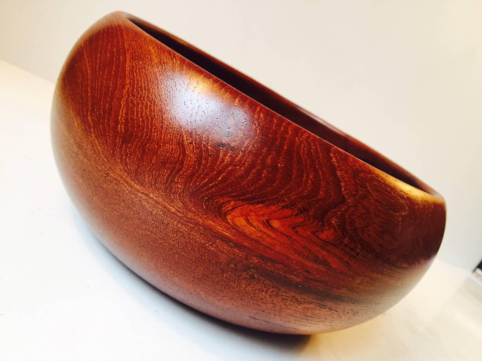 - Handmade bowl of solid Siamese teak
- Emphasis on the grain pattern
- Manufactured and designed by Kay Bojesen in his workshop in Copenhagen during the 1950s
- It is stamped: Kay Bojesen, Copyright, Denmark.