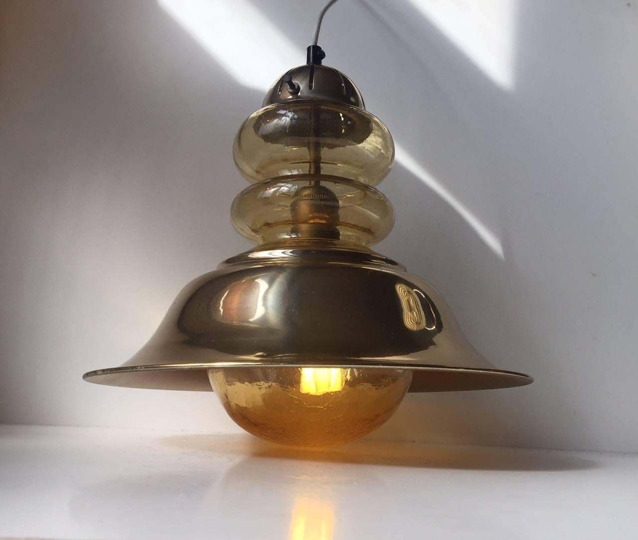Beatifully made Mid-Century pendant ceiling lamp by Vitrika in Denmark. The style is Nautical/Maritime and it will add a cosy twist to any modern interior. The light is in a very nice vintage condition with a litlle ware and patination to the solid