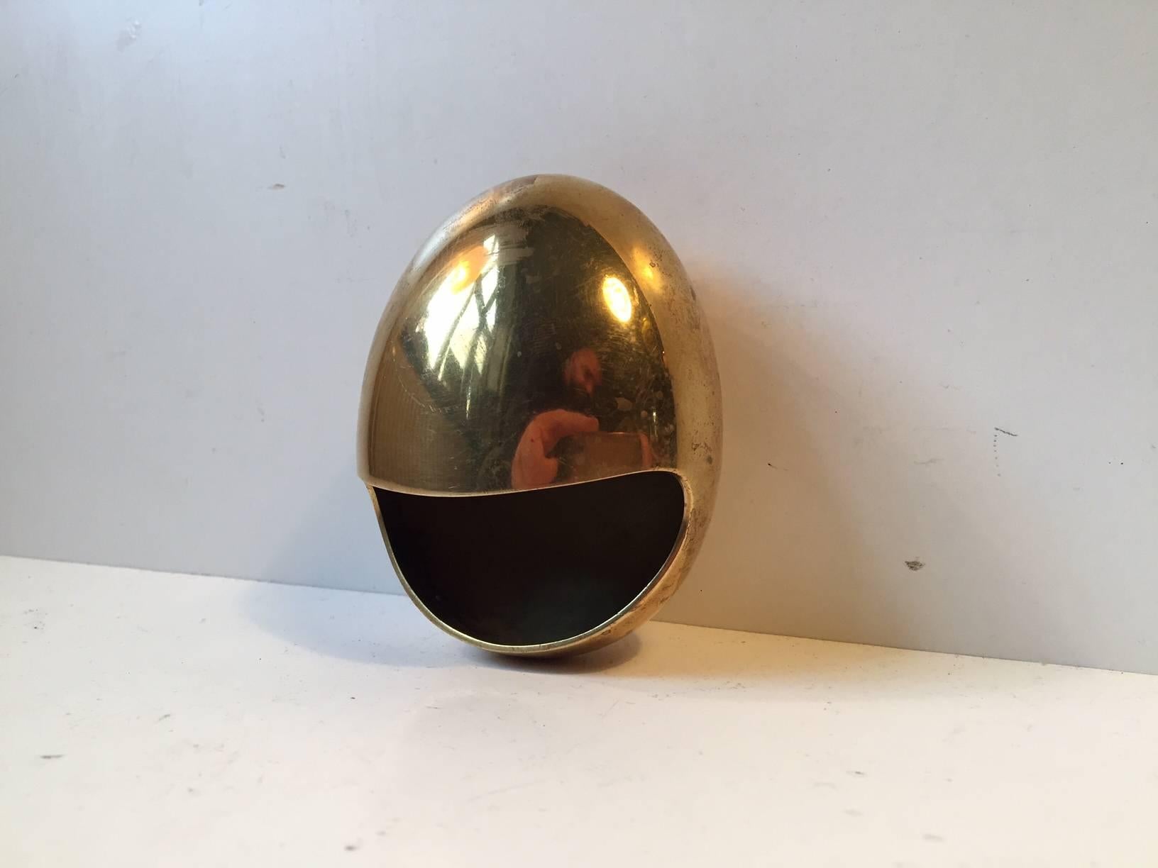Egg shaped solid brass ashtray designed and manufactured by Carl Cohr in Fredericia Denmark during the 1950s. Stamped Cohr, Denmark to the base. It remains in beautiful un-polished vintage condition with very light ware.