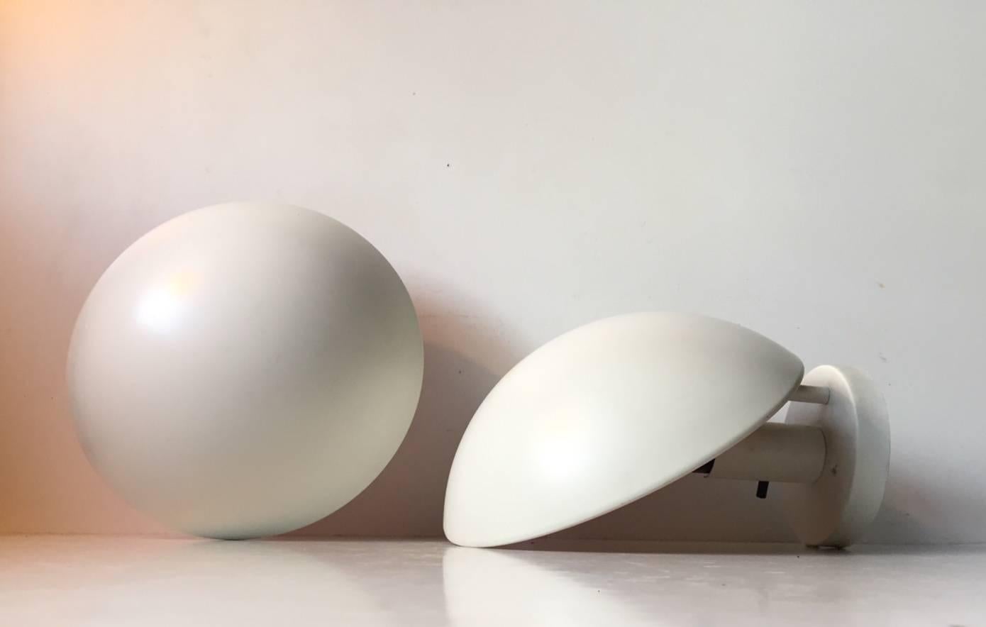 A matching pair of PH Hat wall lamp designed by Poul Henningsen in the late 1970s and manufactured by Louis Poulsen in Denmark. Both labeled with old paper-stickers from Louis Poulsen.