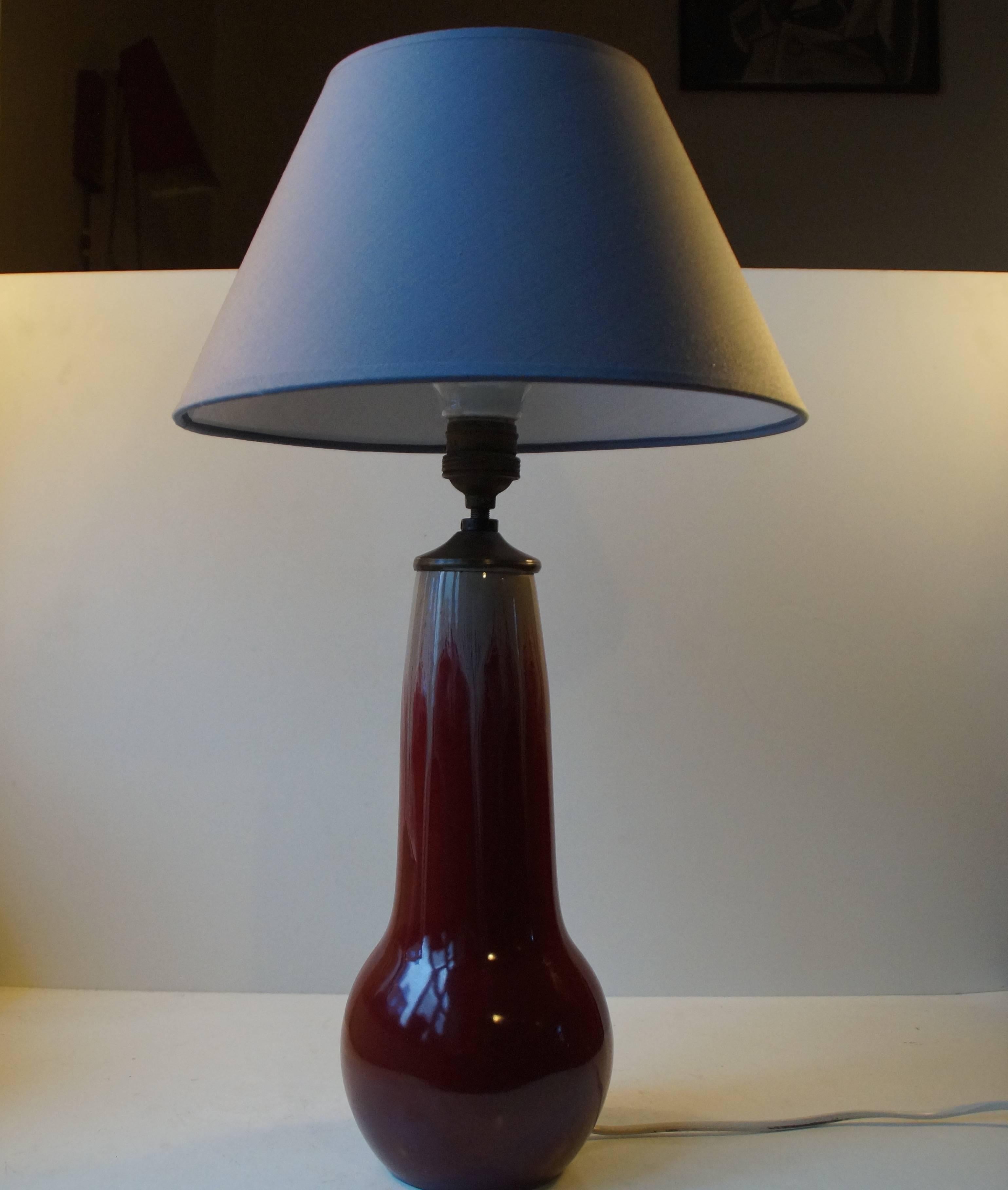 Early Danish modern stoneware table lamp form the 1930s - displaying exceptional techniques in glazes, subtle Art Nouveau styling and shape. Michael Andersen's son Daniel won the Goldmedal at the World's Fair in Brussel in 1935. This piece was