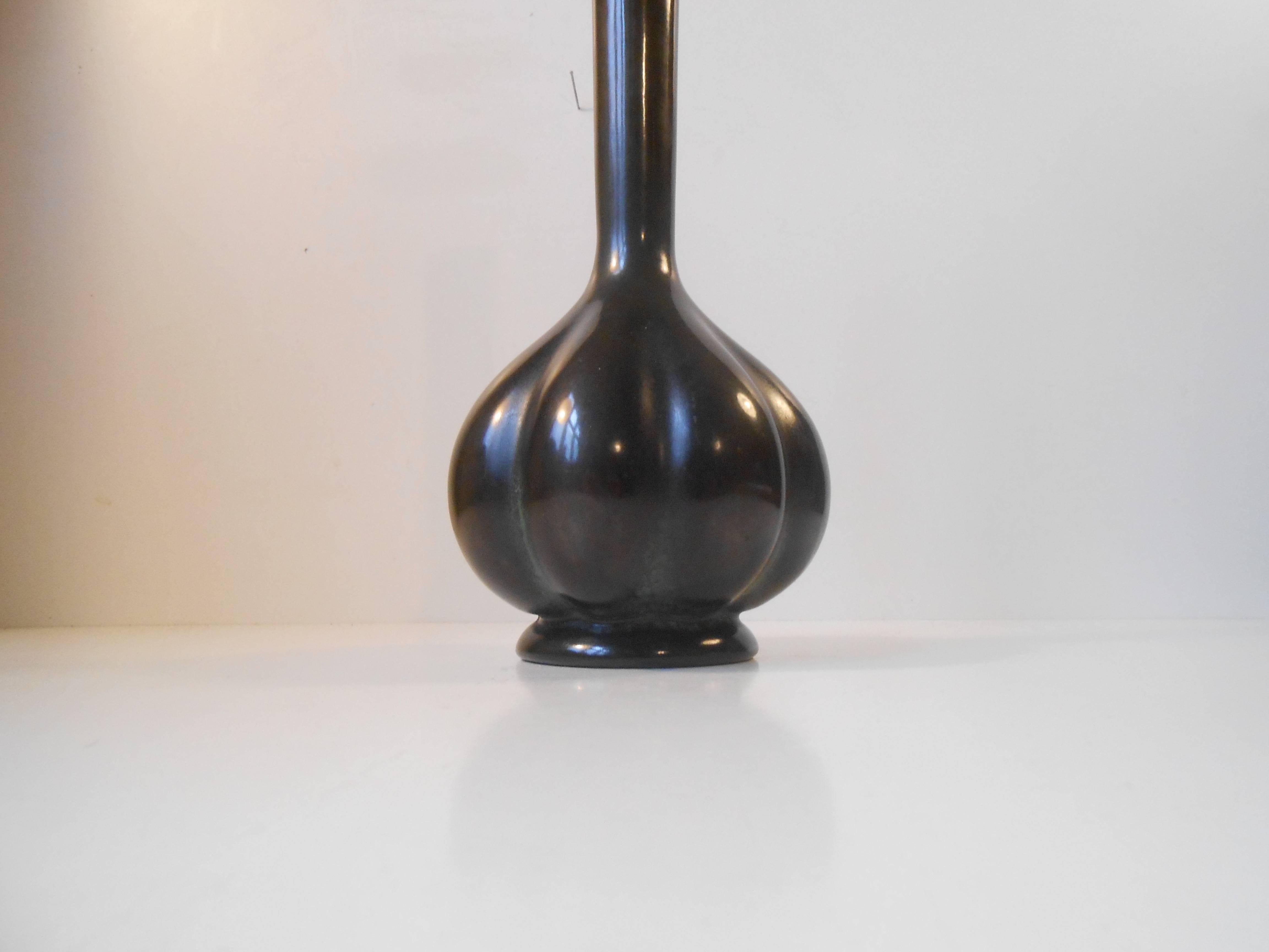 Exceptional piece with pure organically shaped curves and lines. Remarkably similar to ceramic pieces by Axel Salto. This piece is signed to the bottom by unidentified designer/maker. Whether its origin is Scandinavian, Japanese or French is