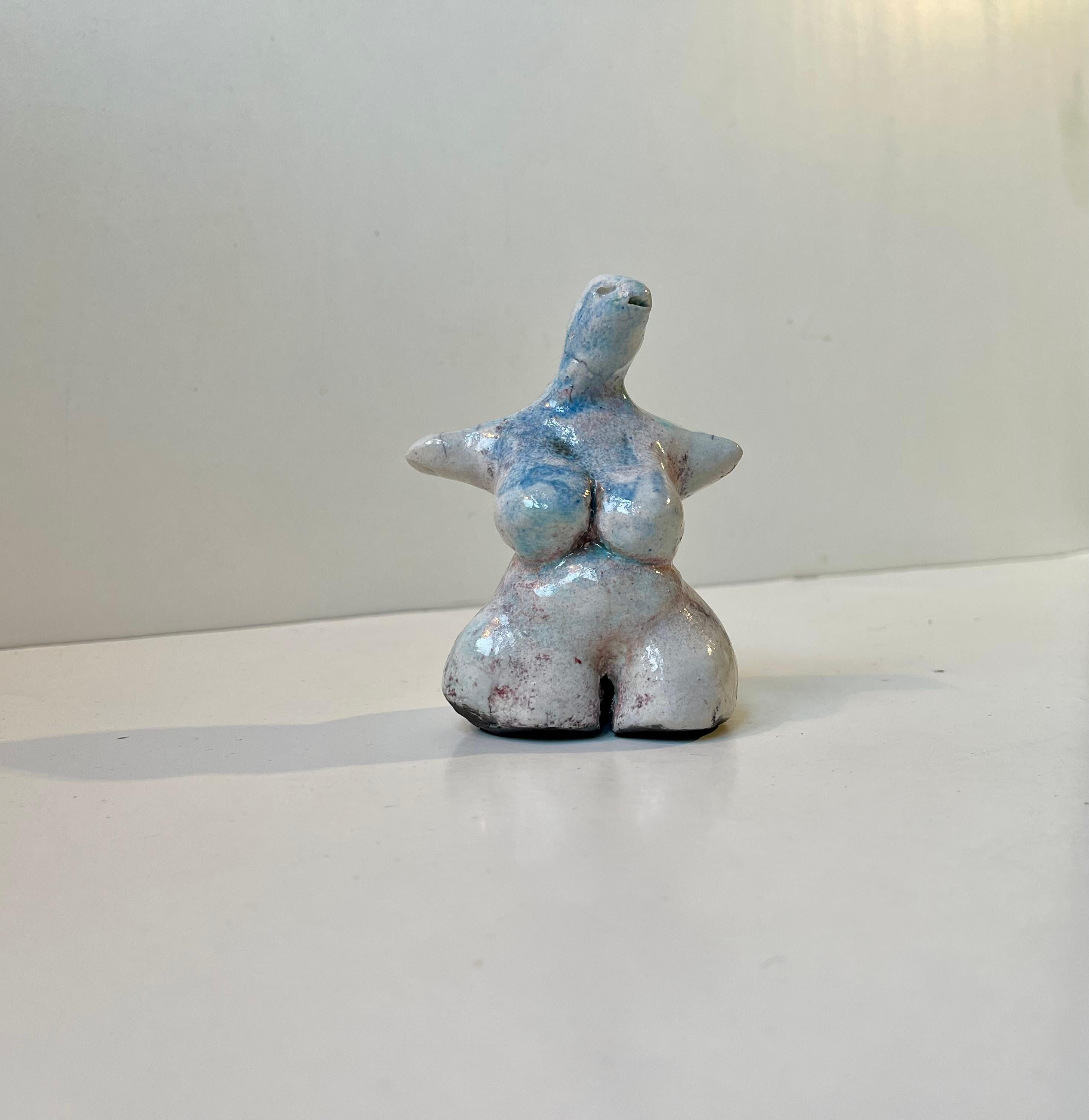 An unusual Scandinavian studio-piece in the shape of this voluptuous female torso with lizard head and neck. Unknown ceramist circa 1970-80 reminiscent of pieces by Beatrice Wood and ÅKE HOLM in particular. It is hard-fired - Raku and has stunning
