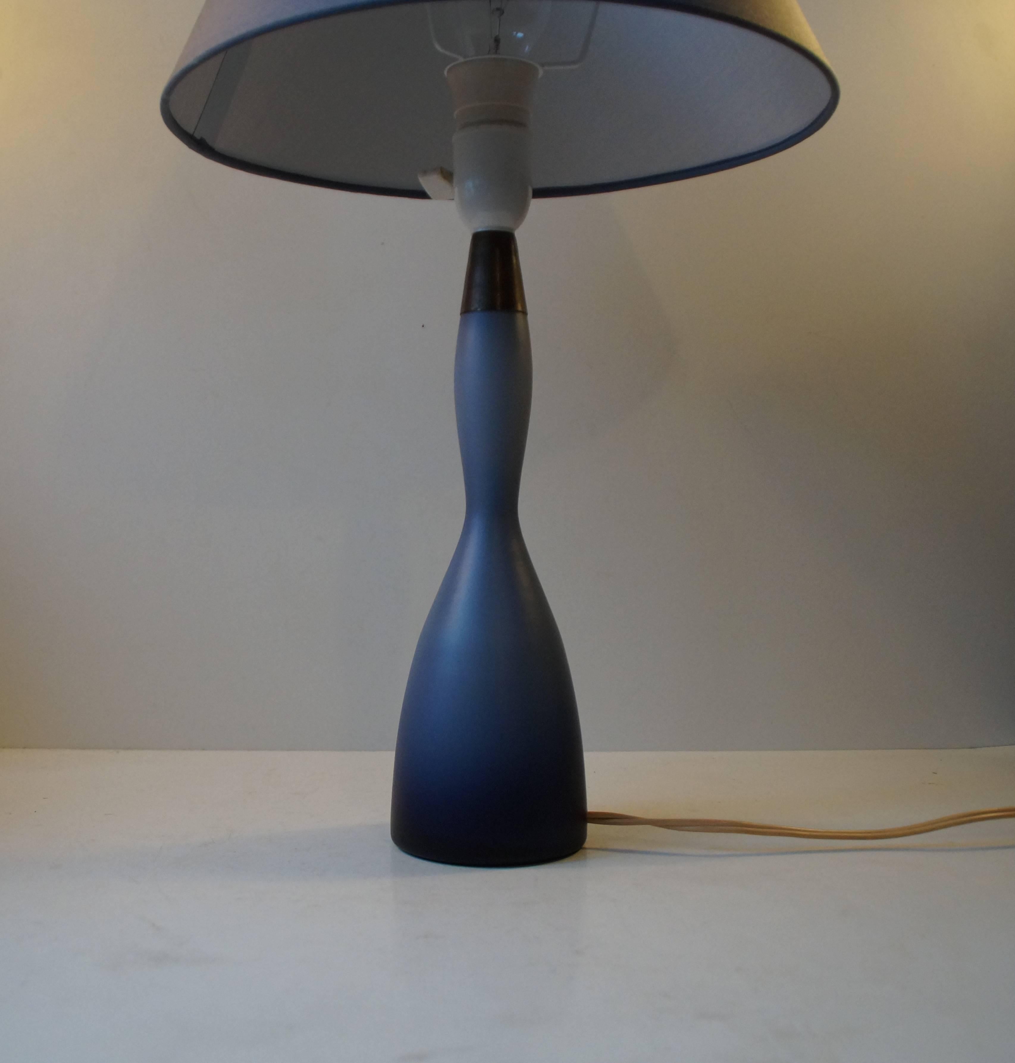Beautiful organically shaped table lamp designed by Bent Nordsted in 1959. Mint condition. Measurements: 14 inches (35 cm) without shade.