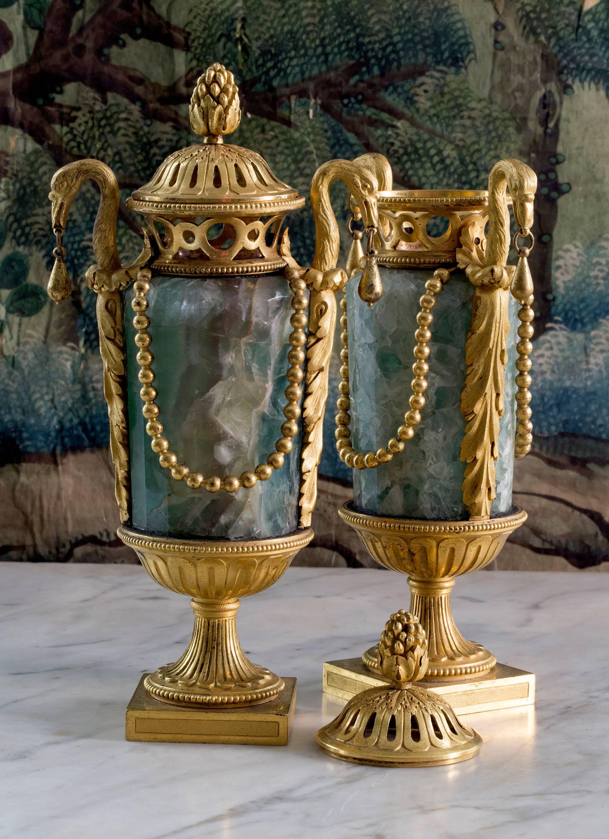 A precious pair of Louis XVI Blue John "pot-pourri" vases richly mounted with swan-shaped handles, France, Louis XVI period, circa 1785.

Blue John is a semi-precious mineral, a beautiful form of fluorite with colors ranging from