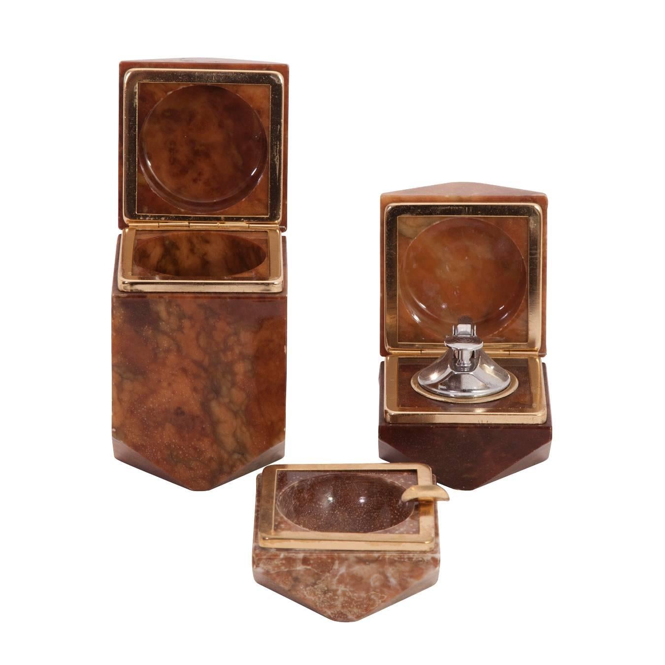 Set of three onyx smoking set with lighter, case and ashtray.