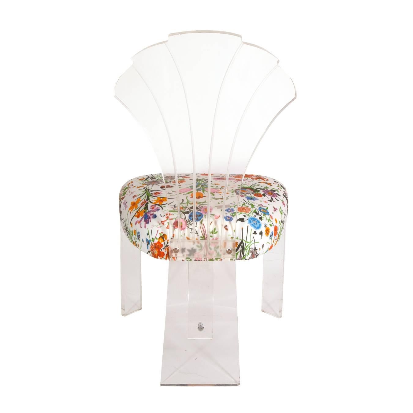 Shellback Lucite chair in Gucci floral fabric.