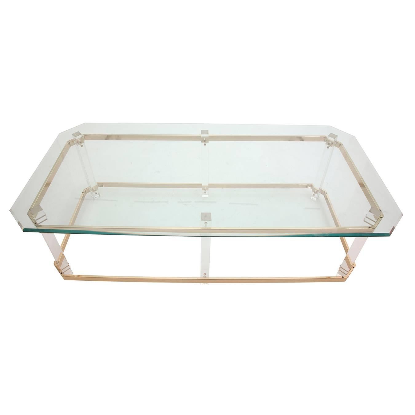 Charles Hollis Jones Lucite, brass and glass side table, circa 1970s.

Side Table:
22.75'' H x 25.75'' L x 22'' D.