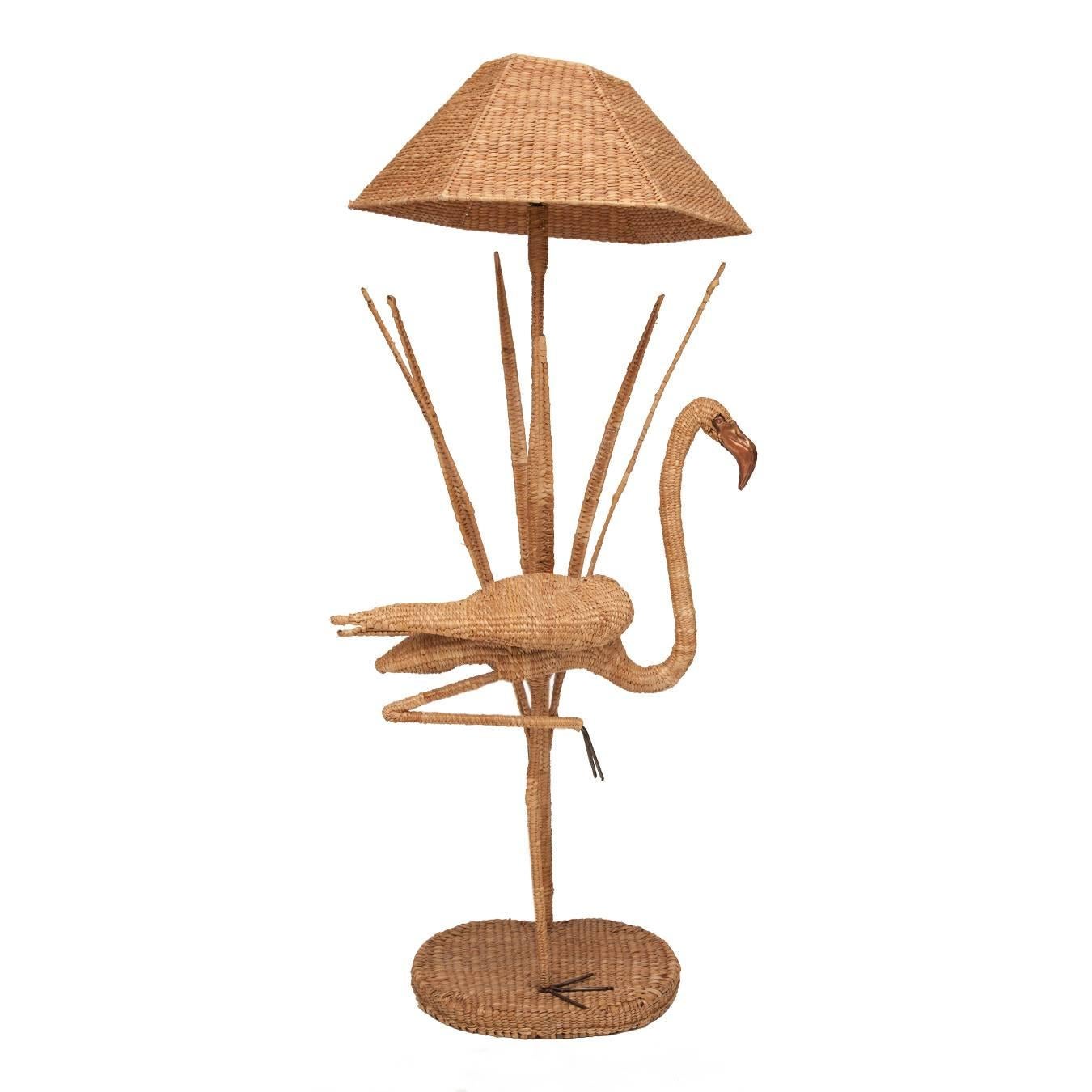 Mario Lopez Torres flamingo wicker floor lamp with bronze accent.
